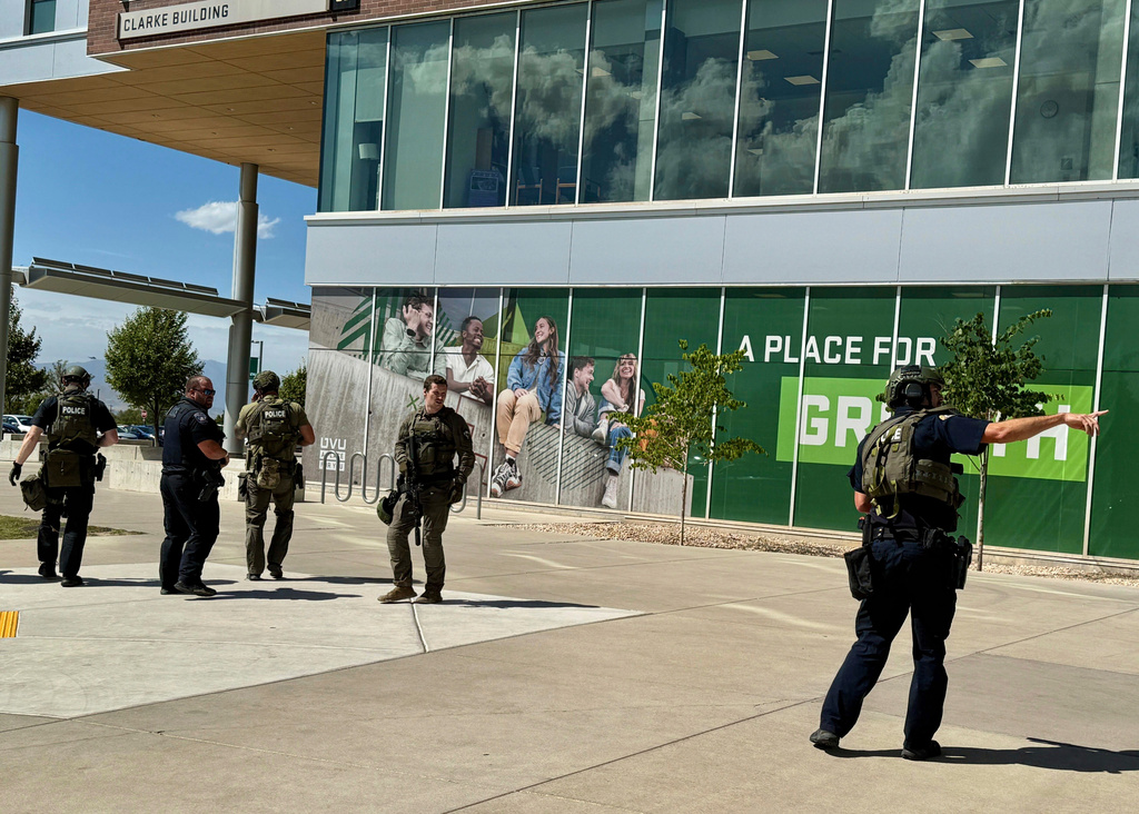 Police work on the campus after Charlie Kirk was shot during Turning Point's visit to Utah Valley University.