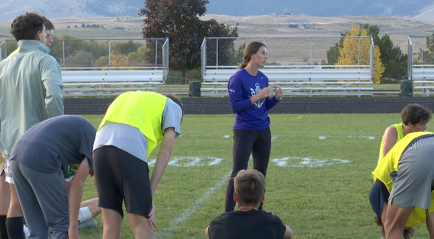 Polson head coach Josie Lies addresses the team after practice, Polson