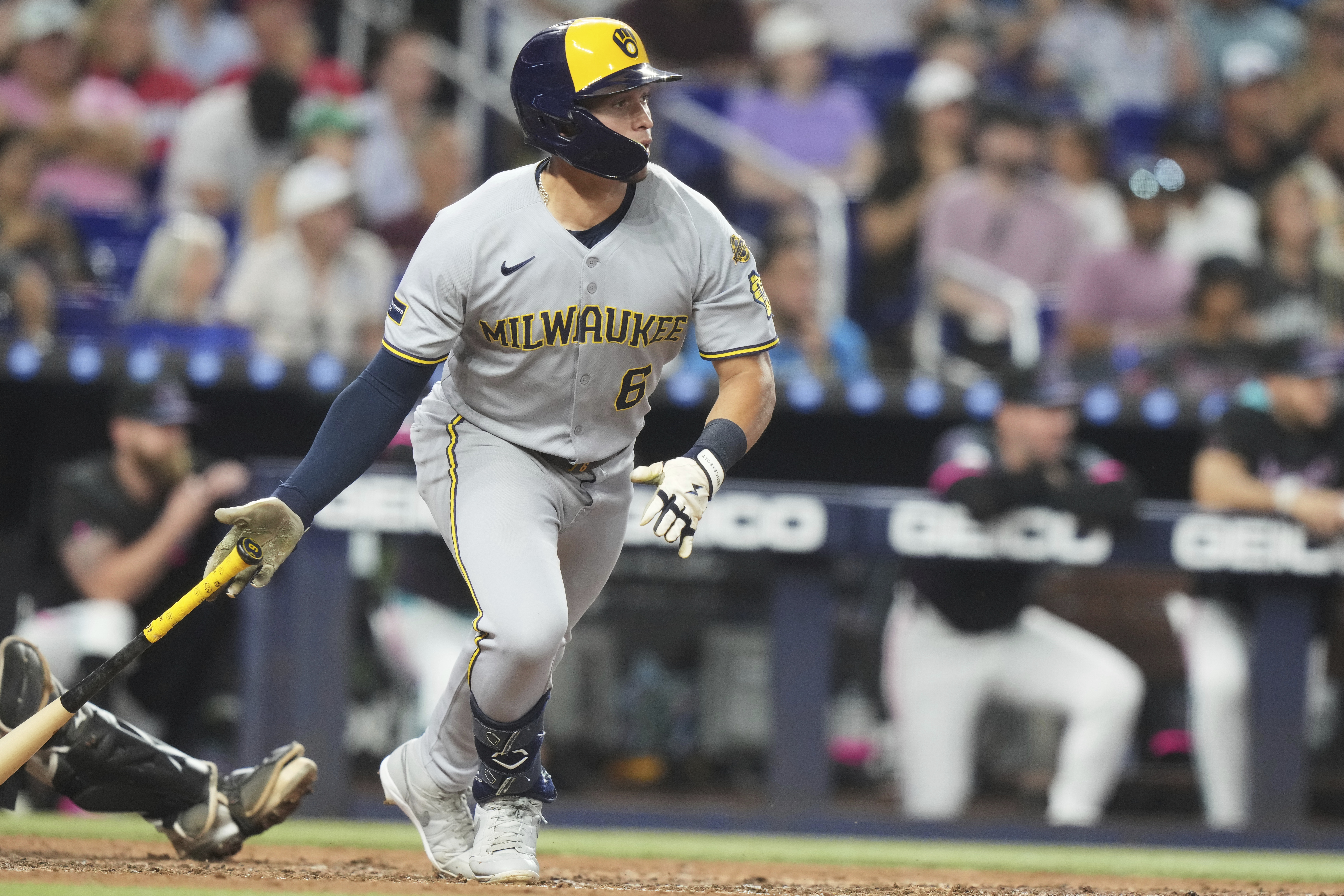 Milwaukee Brewers' Isaac Collins (6) runs after hitting a RBI single to score Jackson Chourio during the fourth inning of a baseball game against the Miami Marlins, Saturday, July 5, 2025, in Miami.