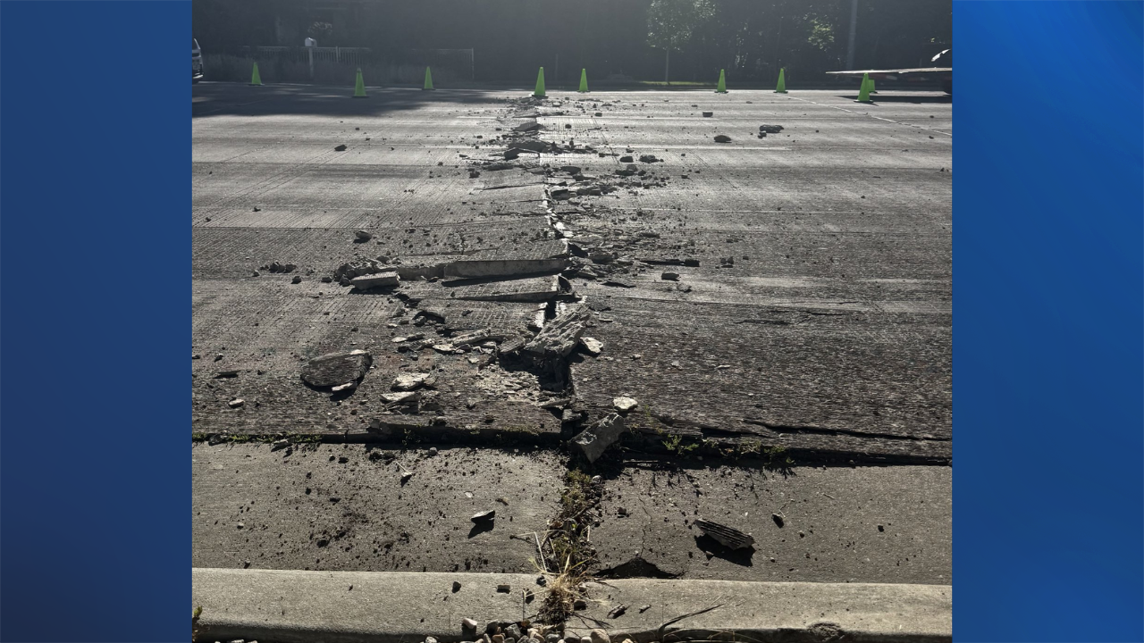 Ogden road reduced to one lane after road buckle leaves massive hump