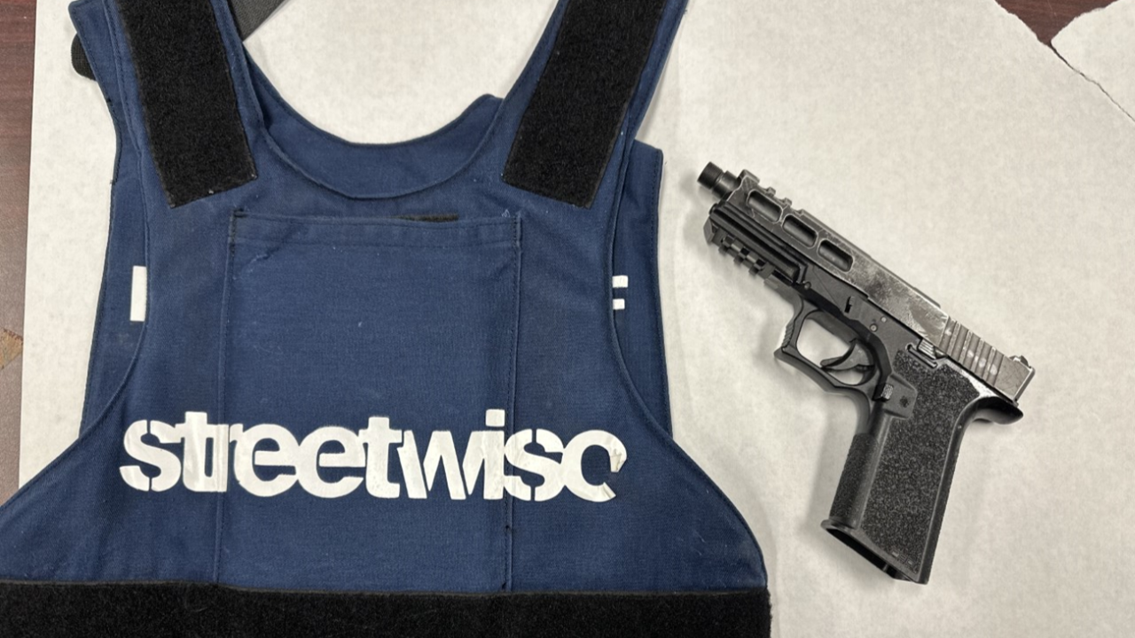 Bulletproof vest and gun