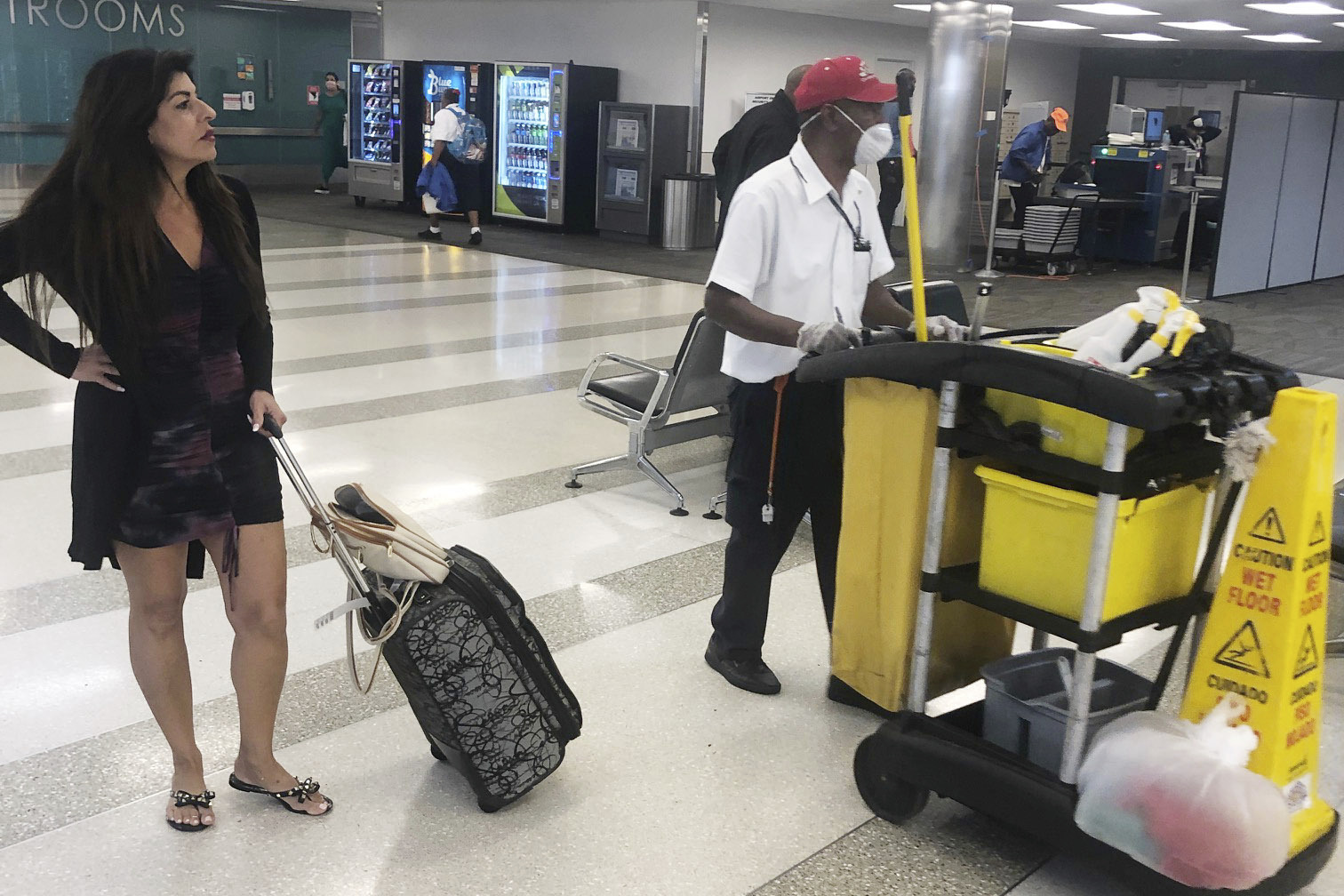 Diane Cascio waits for luggage at Fort Lauderdale-Hollywood International Airport after visiting family in New York, March 2020