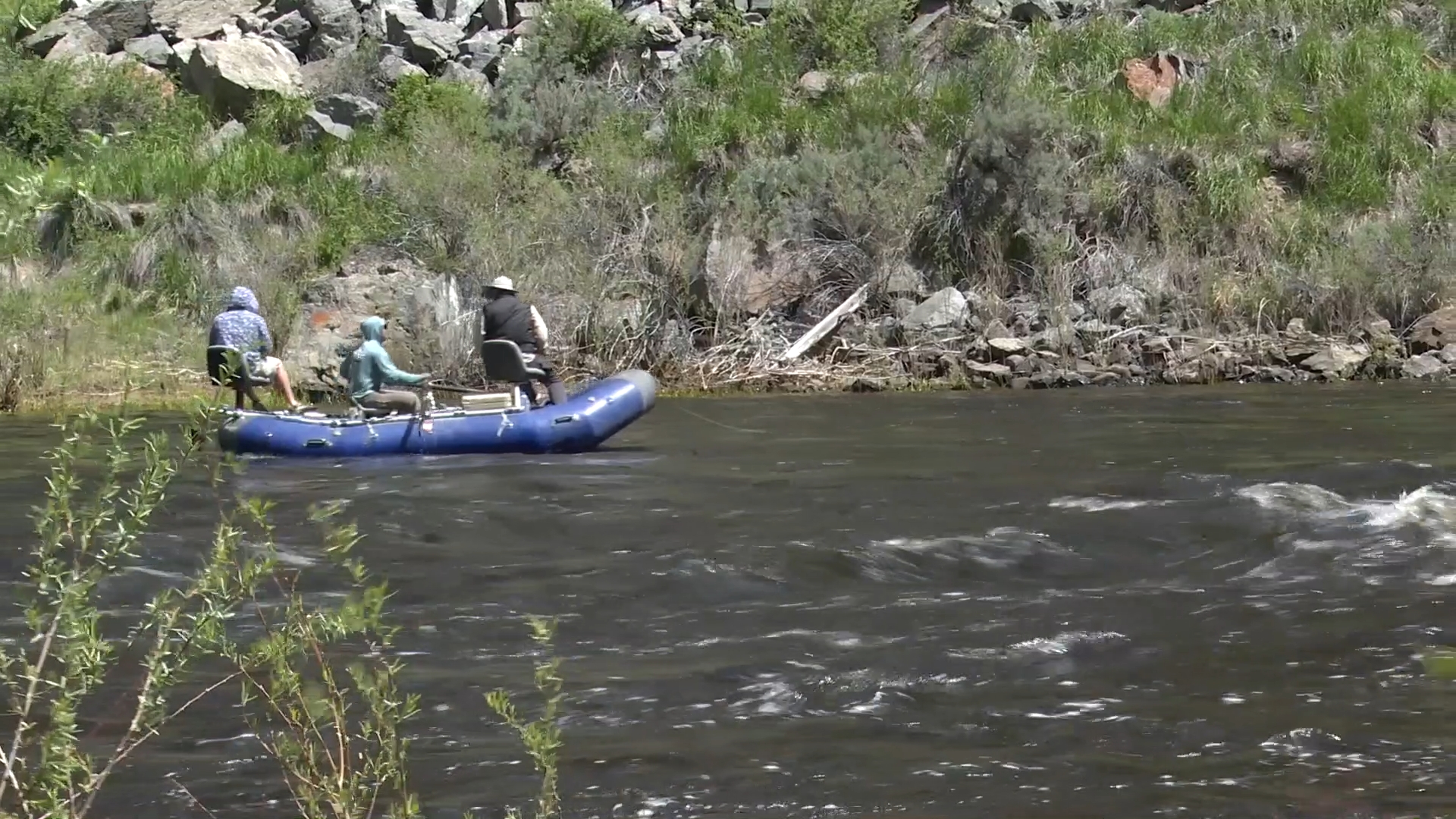 Fishermen on the river