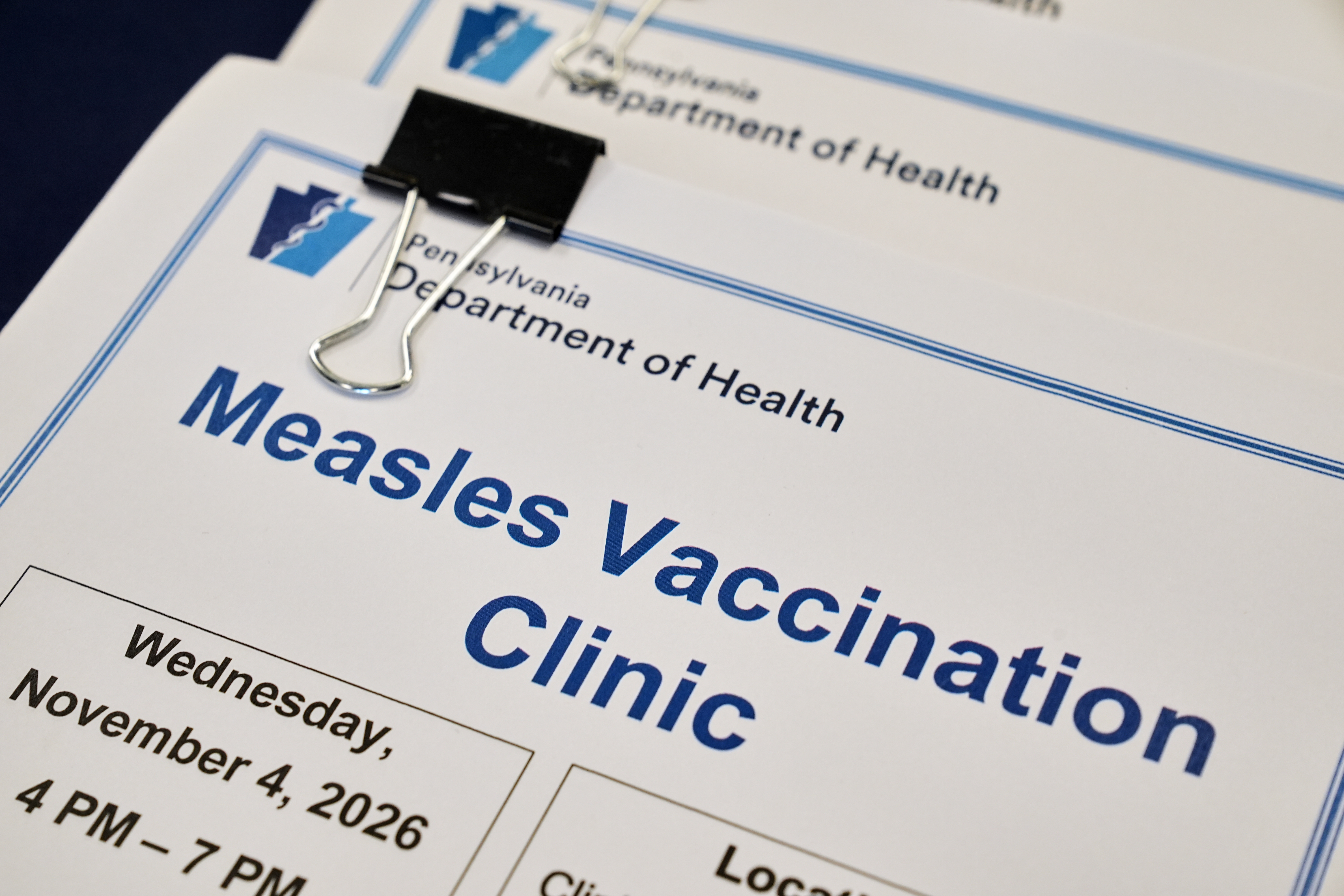 A flyer is displayed at a Pennsylvania Department of Health measles vaccination clinic located in Lancaster County in Peach Bottom, Pa., Tuesday, Oct. 20, 2026.