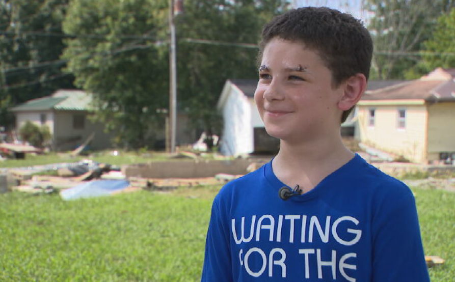 Ripped from his mother, 8-year-old boy survives Waverly flood on his own