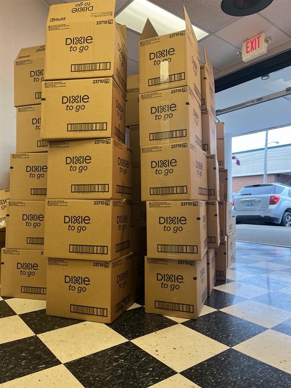 Operation Secret Santa packs 2,000 food boxes for those in need