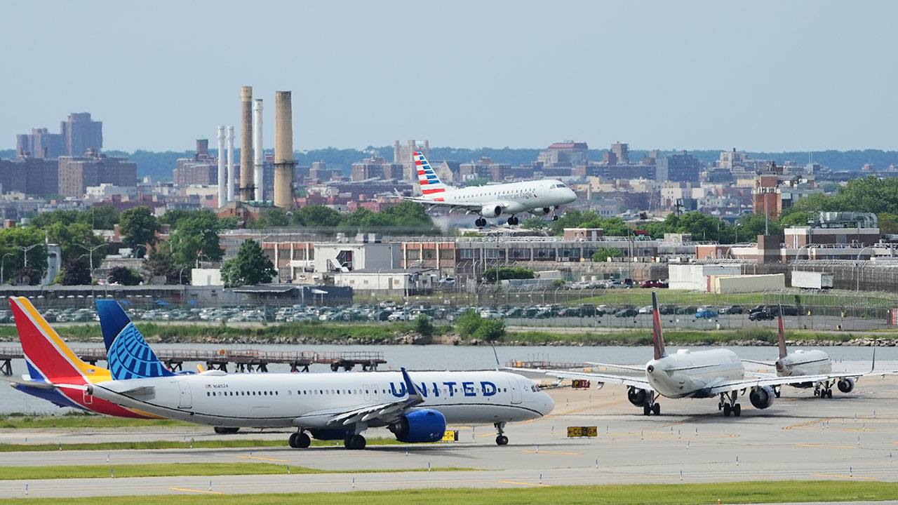 Planes navigate LaGuardia Airport Friday, May 22, 2026, in New York.