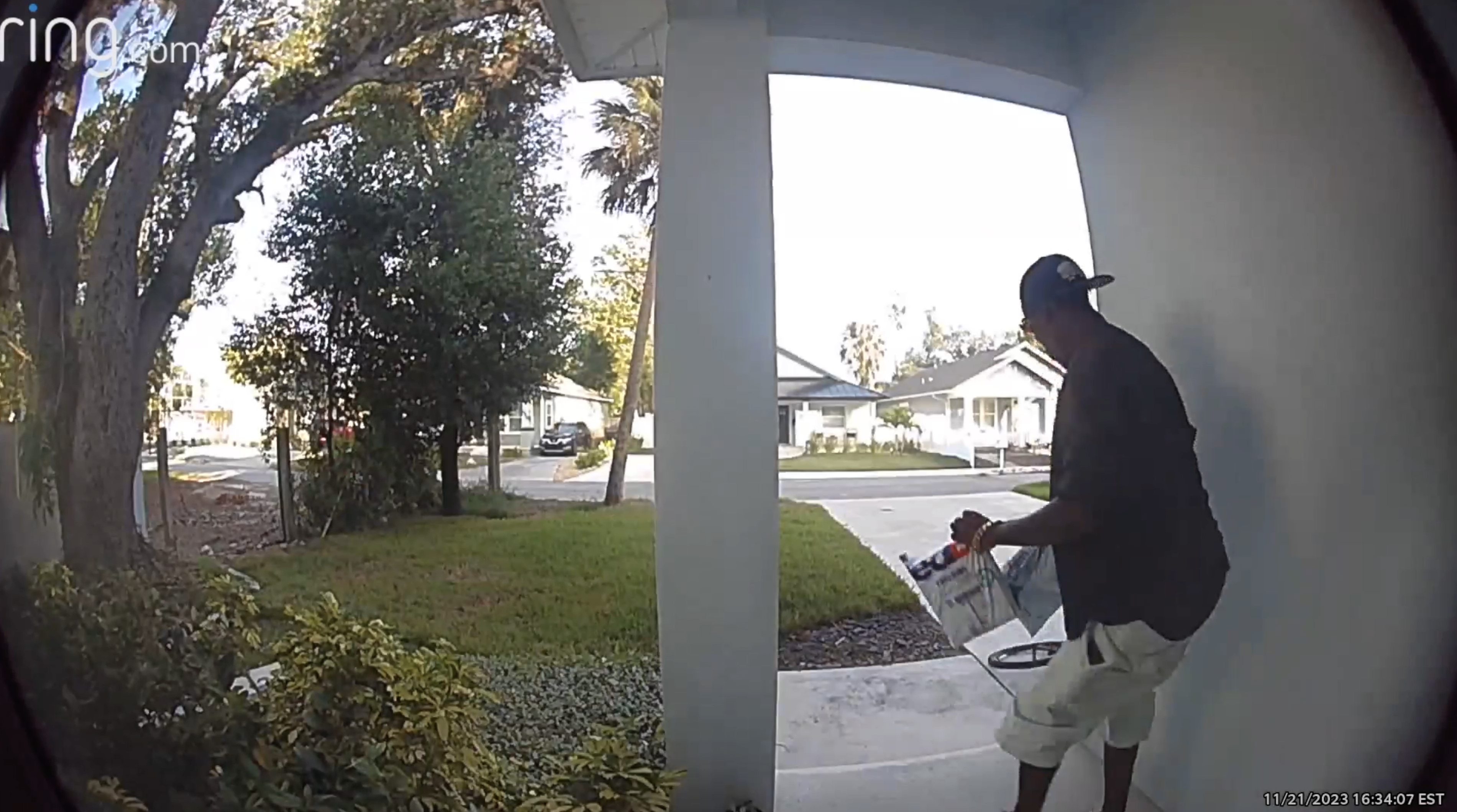 A man steals a package of a porch in Tampa. 