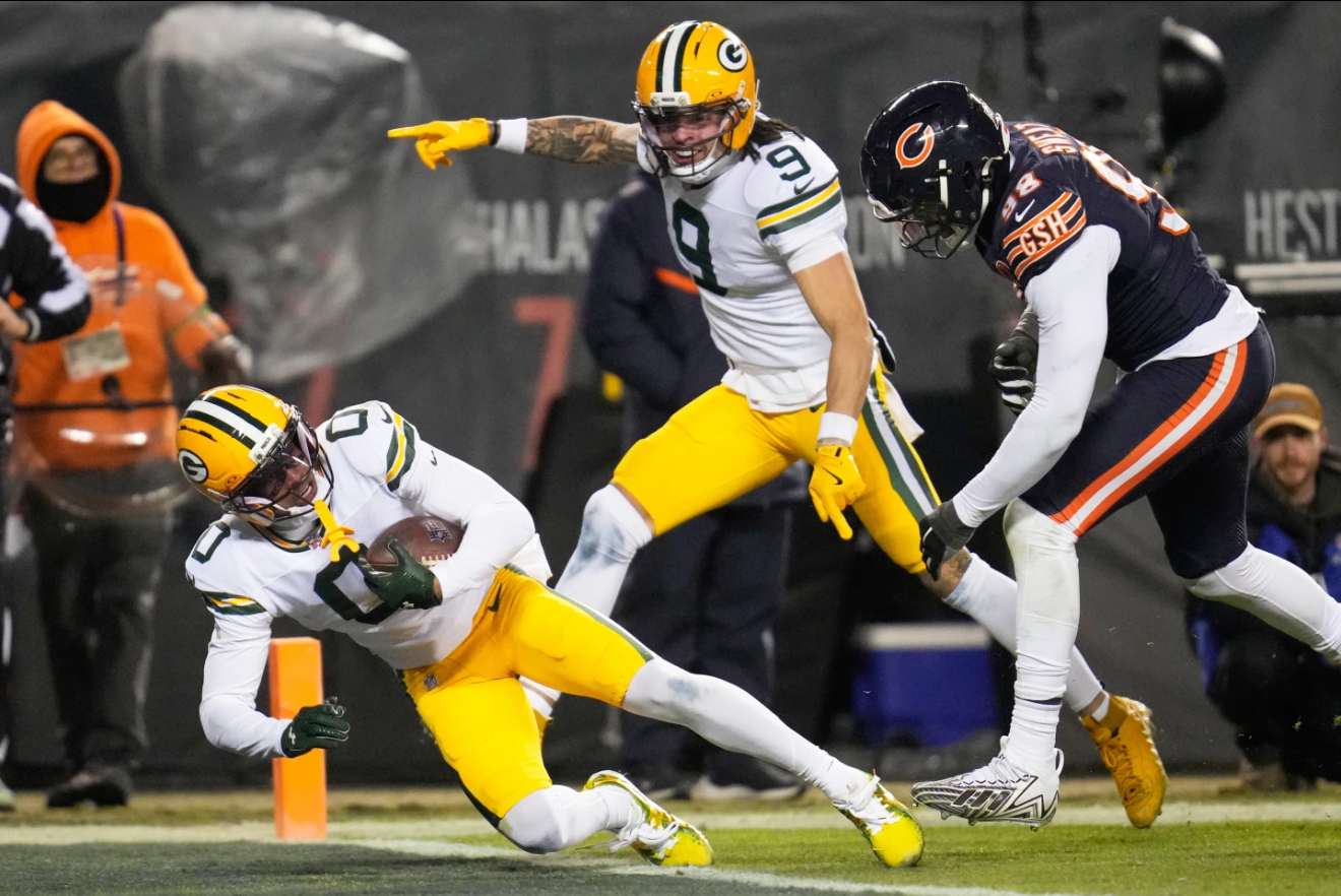 Green Bay Packers' Matthew Golden gets past Chicago Bears' Montez Sweat for a touchdown during the second half on an NFL wild-card playoff football game Saturday, Jan. 10, 2026, in Chicago, Ill.