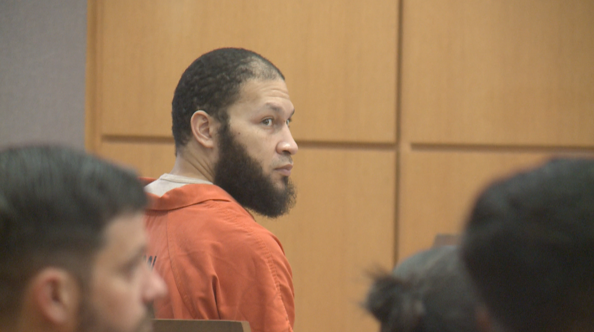 Angelo McDuffie sitting in court