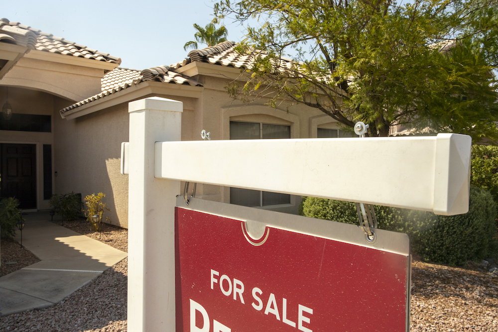 House Sold Sale Sign