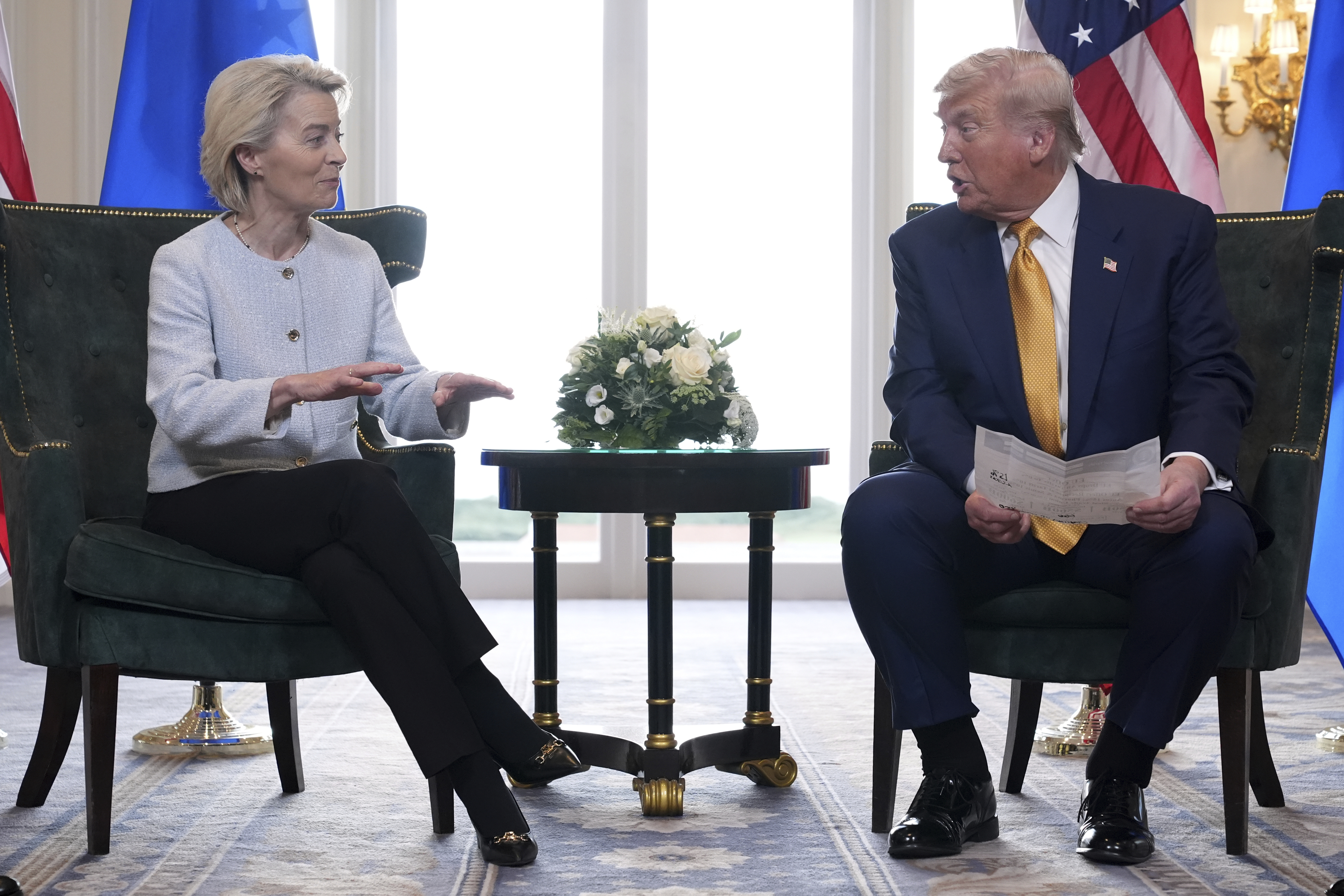 President Donald Trump and European Commission President Ursula von der Leyen talk after reaching a trade deal at the Trump Turnberry golf course in Turnberry, Scotland Sunday, July 27, 2025.