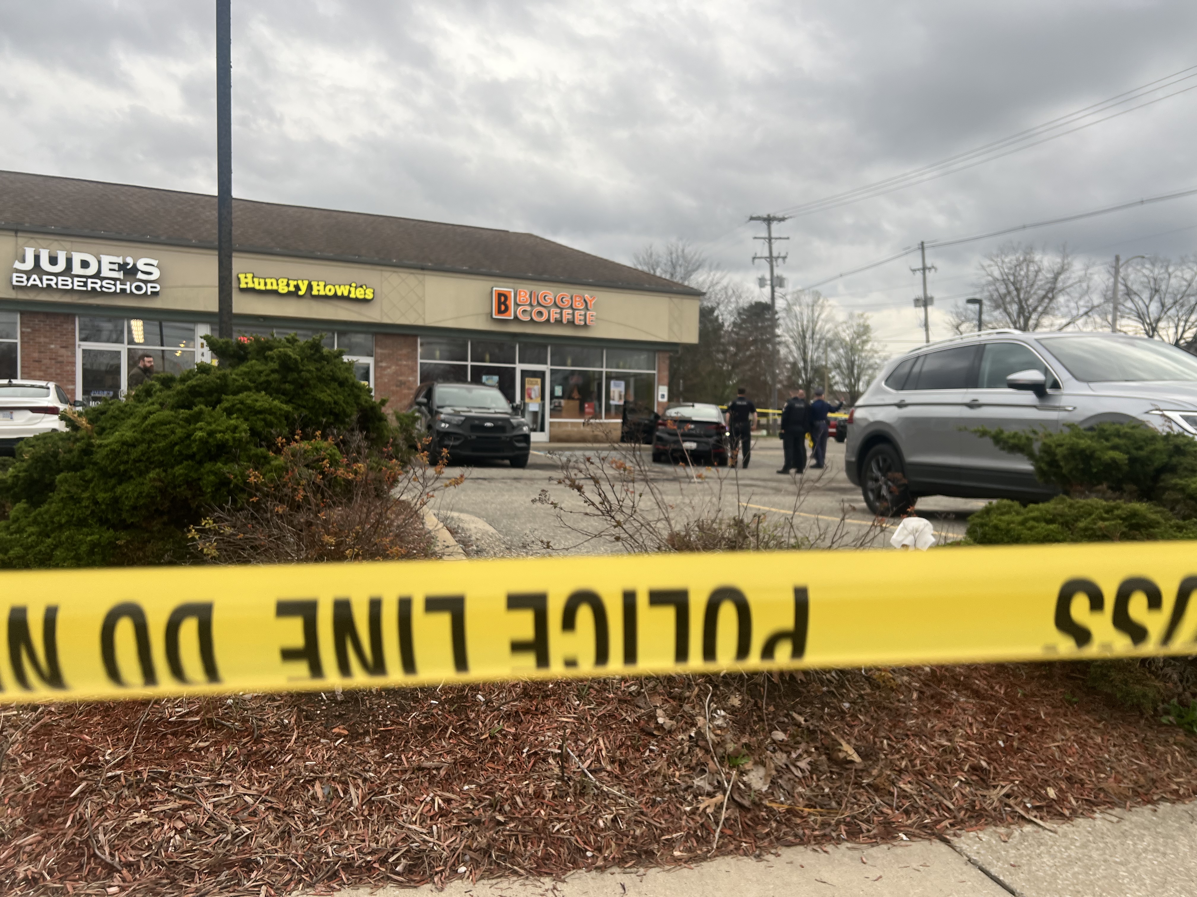 East Lansing police shoot a suspect following a stabbing at a local business