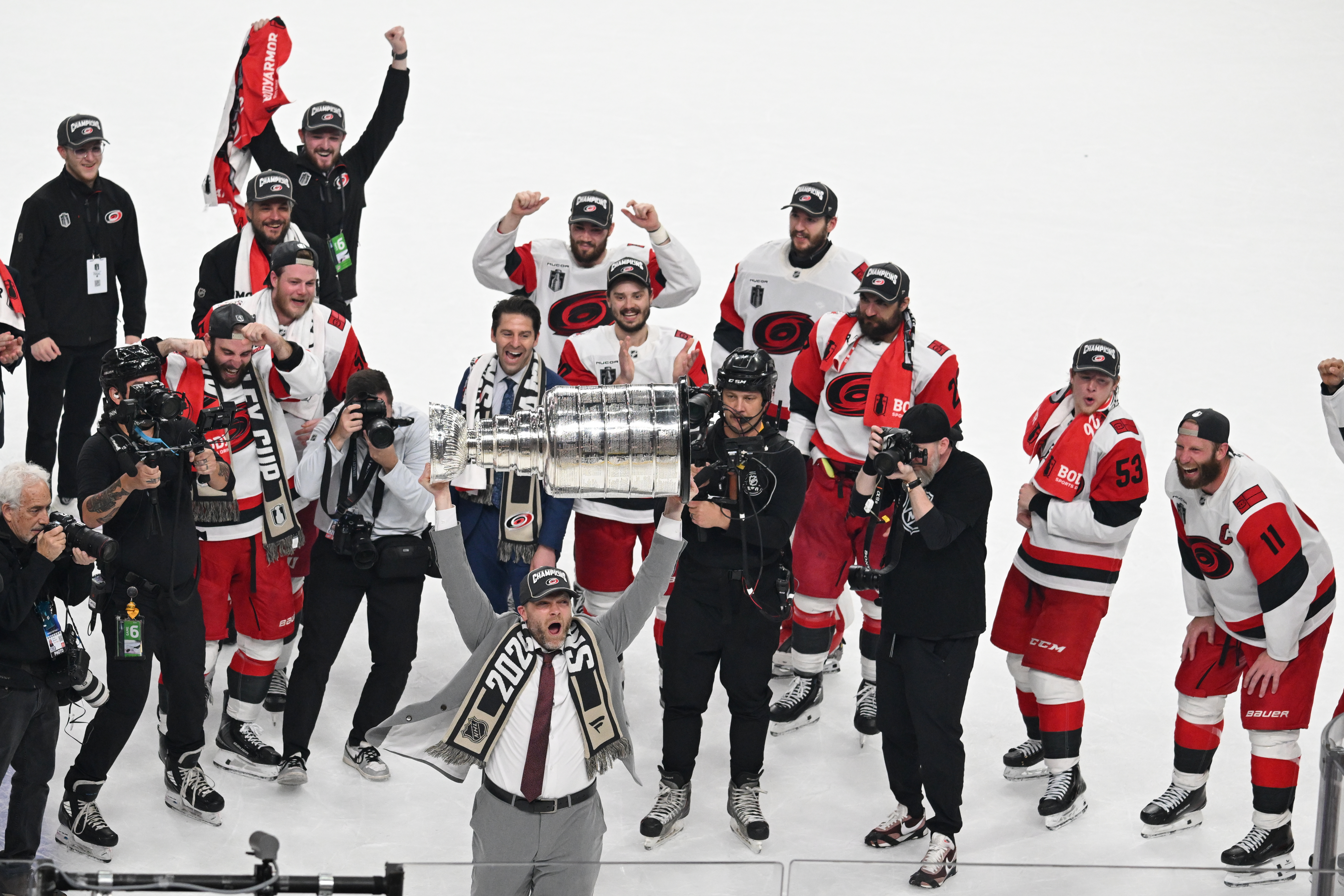 The Carolina Hurricanes celebrates after a win over the Vegas Golden Knights in Game 6 of the NHL hockey Stanley Cup Final series, Sunday, June 14, 2026, in Las Vegas.