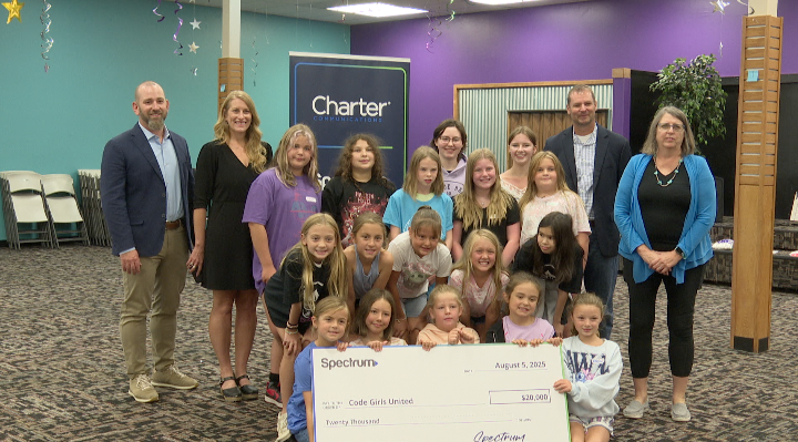 Spectrum presents 20 thousand dollar check to Code Girls United, Kalispell