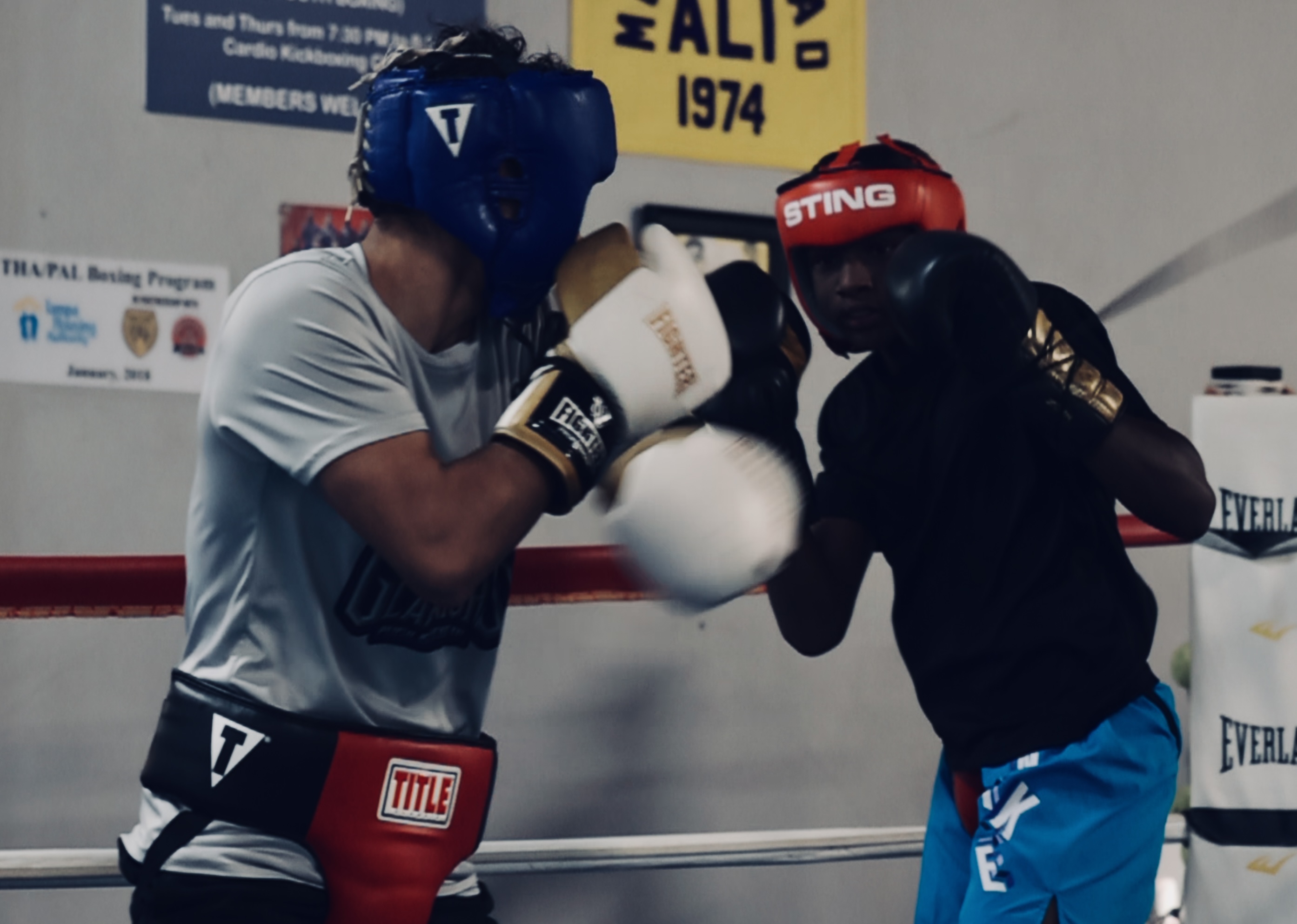 Teens spar at the Tampa PAL Boxing Program.