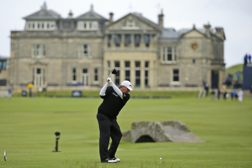 Mark Calcavecchia plays from the 18th tee during the first round of the British Open Golf Championship at the Old Course, St. Andrews, Scotland, Thursday, July 16, 2015. 