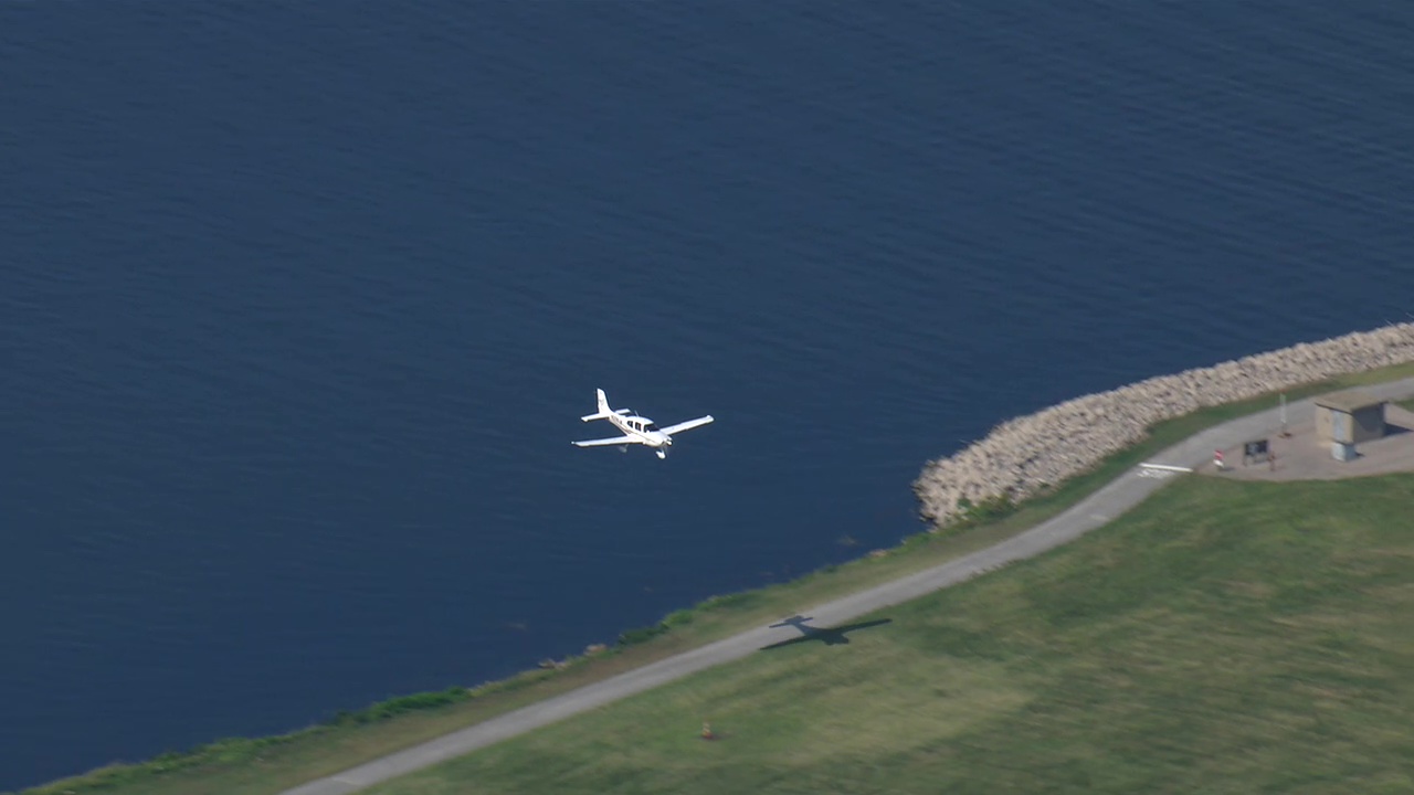 A plane prepares to touch down at Burke Lakefront Airport.