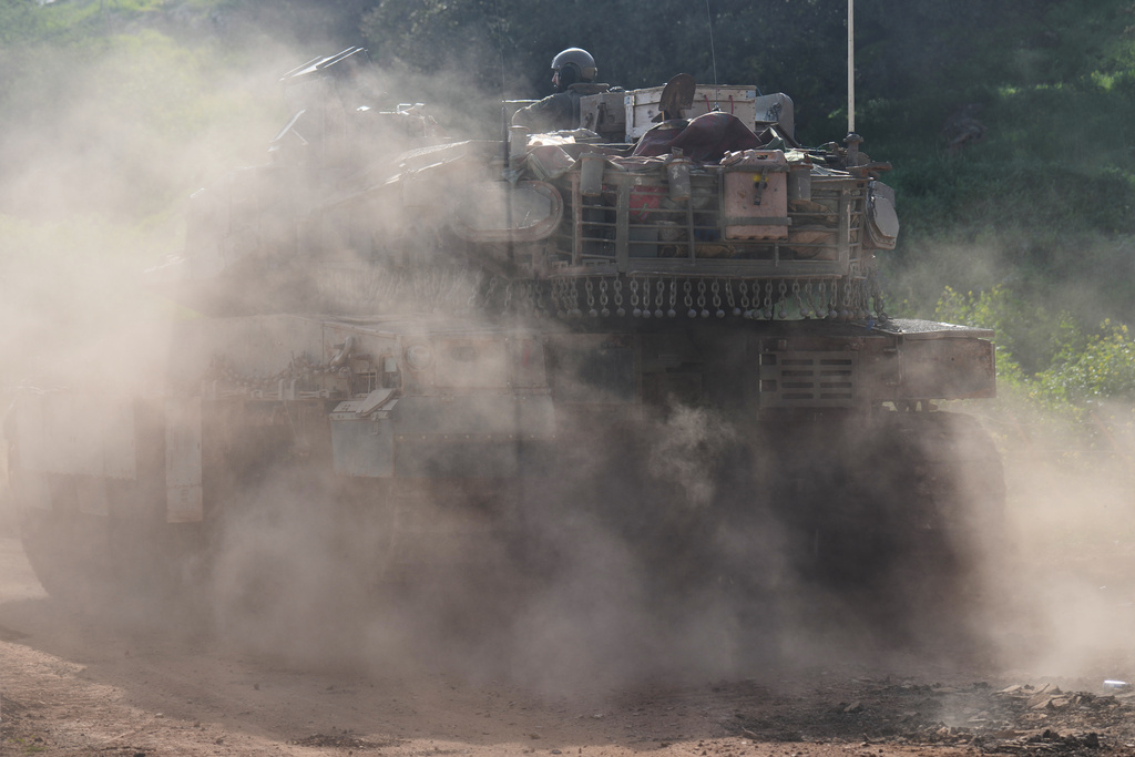 An Israeli tank maneuvers in northern Israel near the border with Lebanon, Friday, March 6, 2026. 