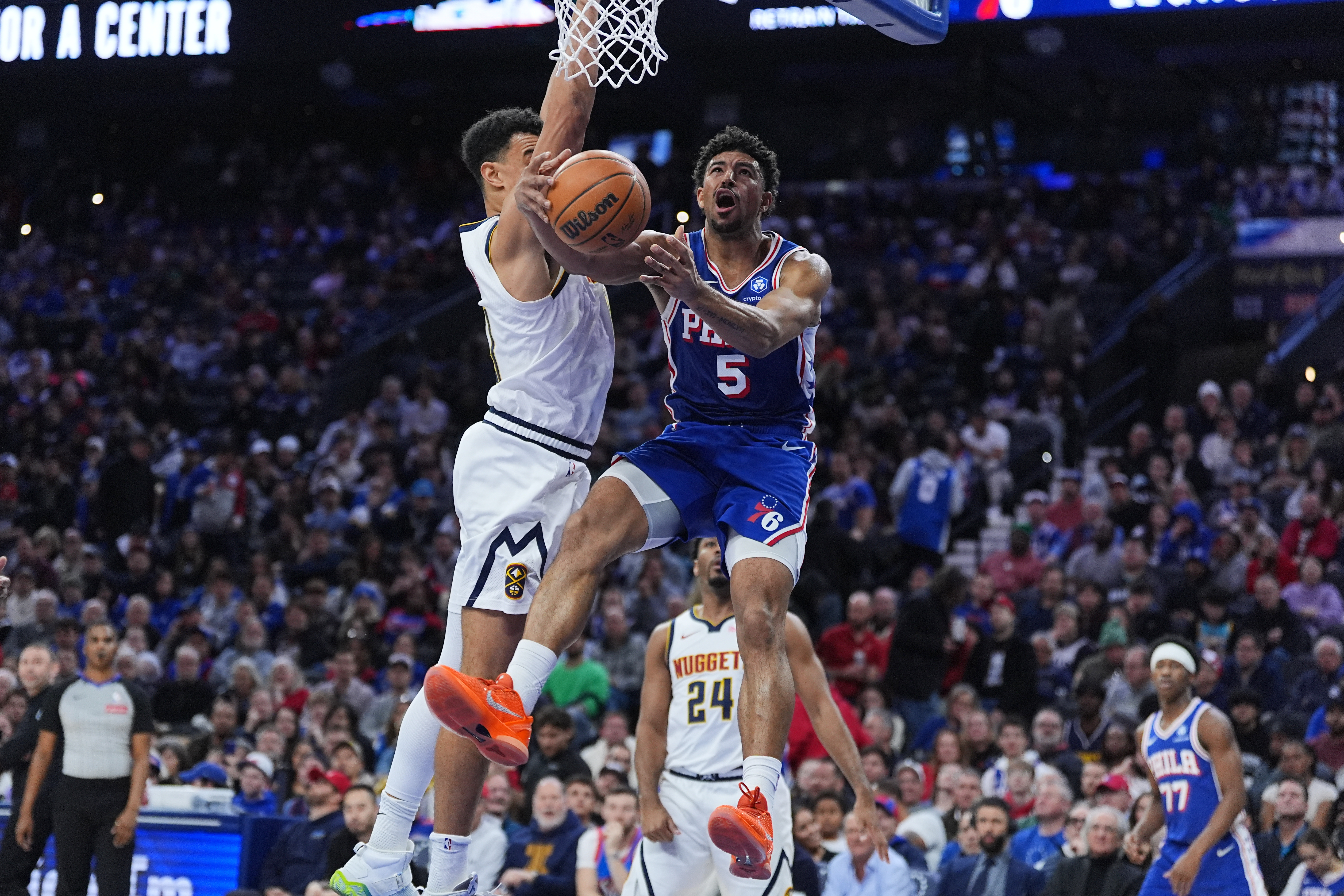 Brown's goaltended layup in OT lifts short-handed Nuggets over 76ers 125-124