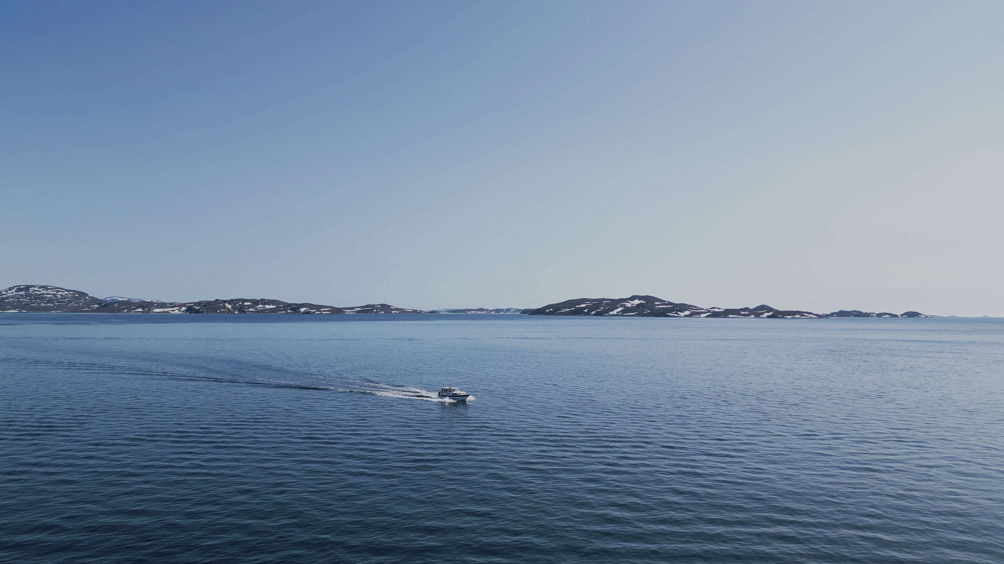 A boat sails at sea near Nuuk, Greenland, Wednesday, June 18, 2025. 