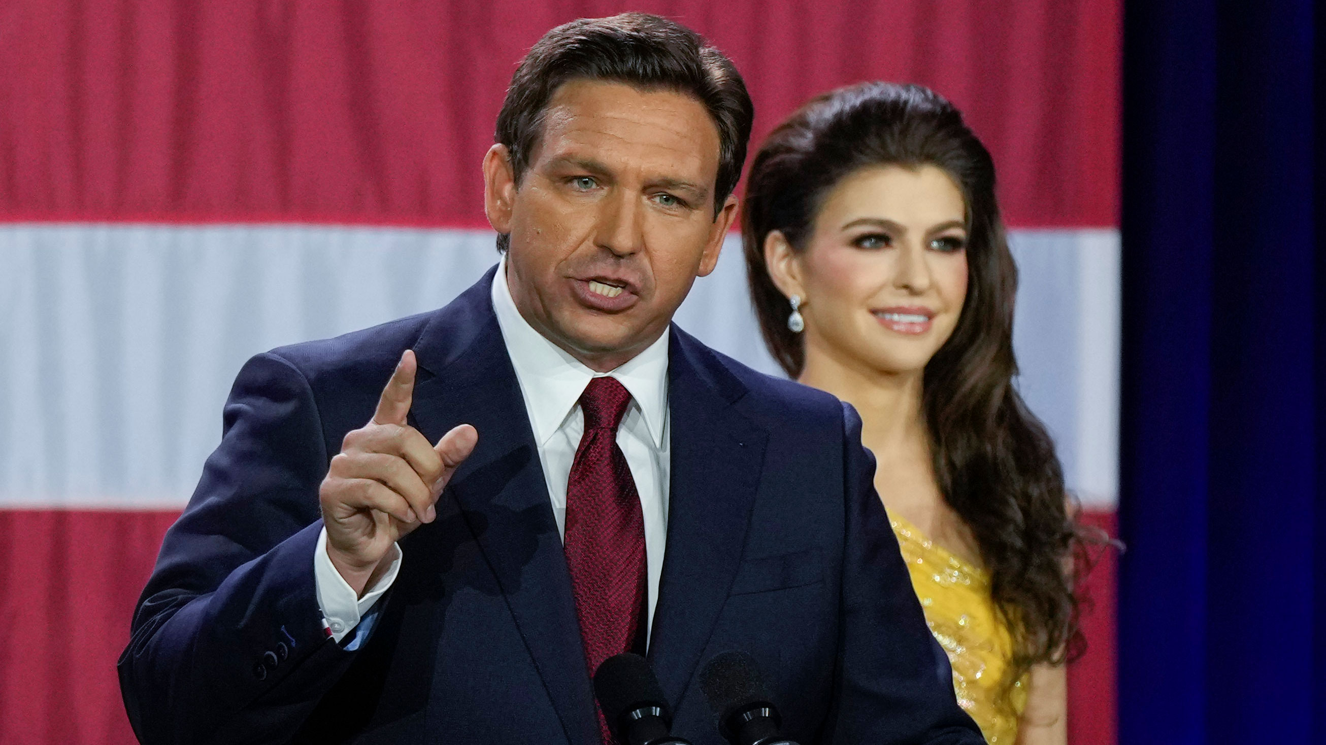 Incumbent Florida Republican Gov. Ron DeSantis speaks to supporters at an election night party after winning his race for reelection in Tampa, Fla., Tuesday, Nov. 8, 2022, as his wife Casey listens.