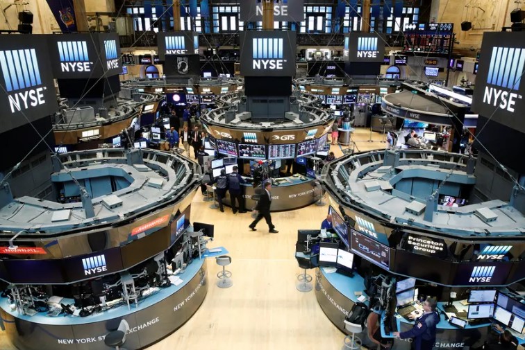 Traders work on the floor of the New York Stock Exchange in New York on August 23, 2016. A group of financial firms and investors are planning on launching a stock exchange in Dallas this year.