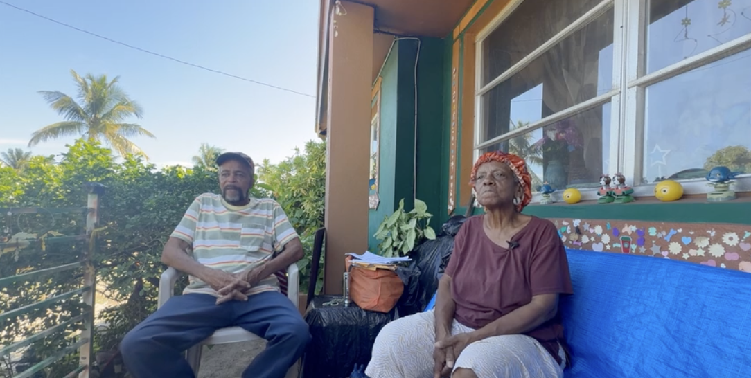 James and Mammie Wright sit outside of their Boynton Beach home