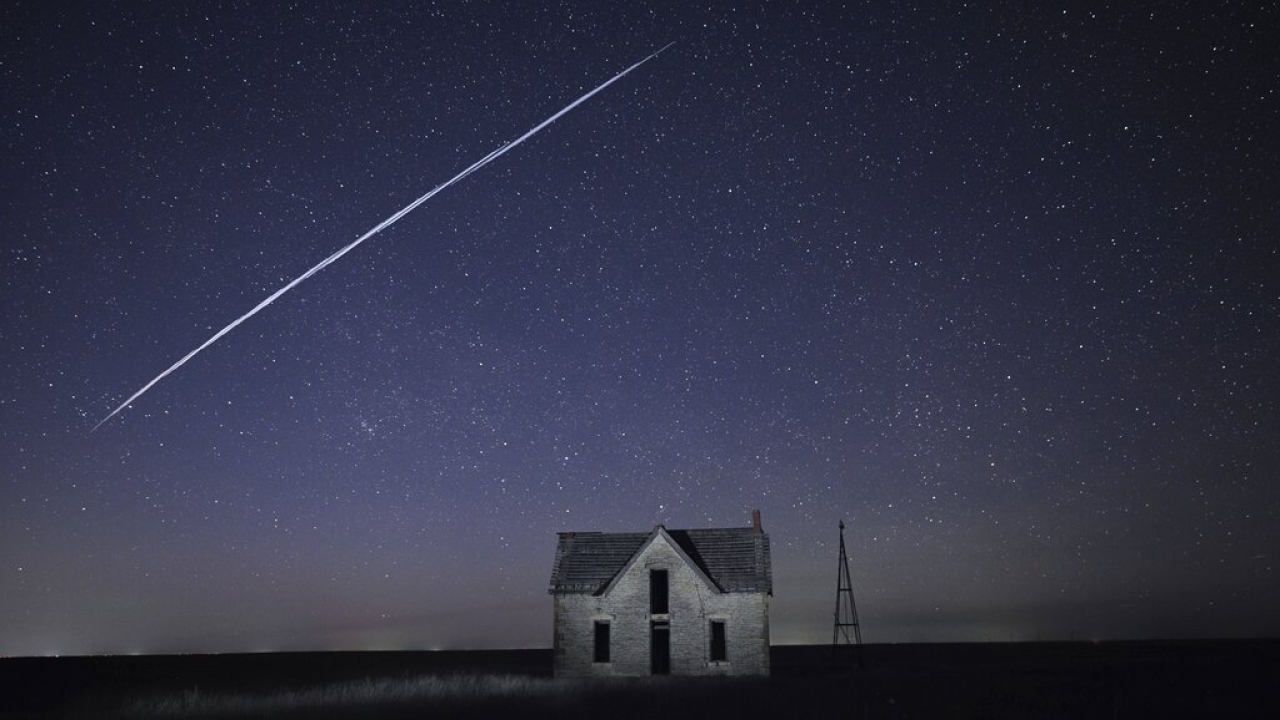 A string of Elon Musk's SpaceX StarLink satellites in the night sky.