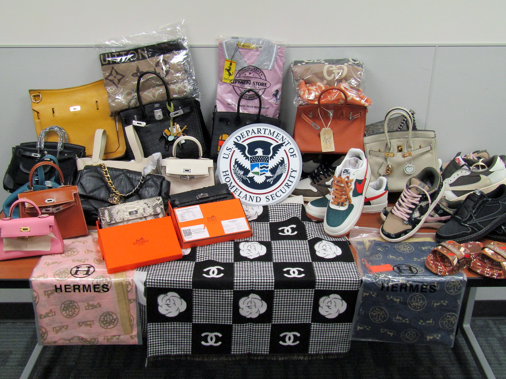 Norfolk CBP Officers Seize Over $700K in Counterfeit Designer Brand Clothes, Shoes, Purses .jpg