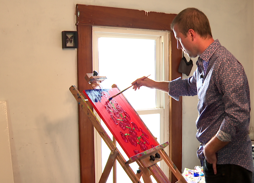 Frank Hiffernan paints hollyhocks for his upcoming solo exhibition in Omaha.