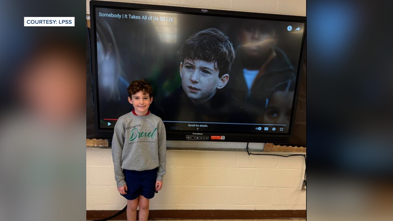 Wesley in front of his commercial 