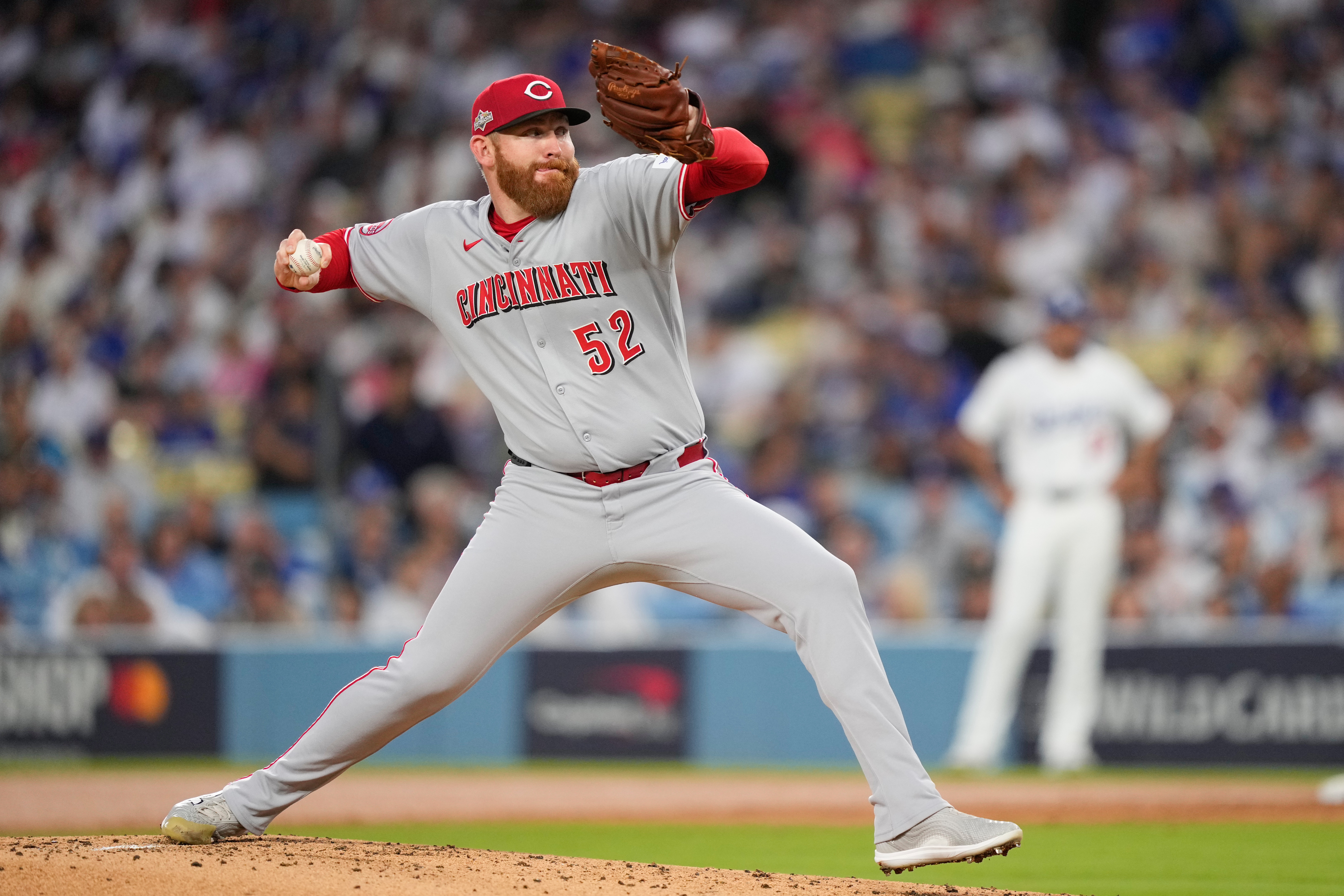 Cincinnati Reds starting pitcher Zack Littell throws to a Los Angeles Dodgers batter during the second inning in Game 2 of the National League Wild Card baseball playoff series Wednesday, Oct. 1, 2025, in Los Angeles. (AP Photo/Mark J. Terrill)