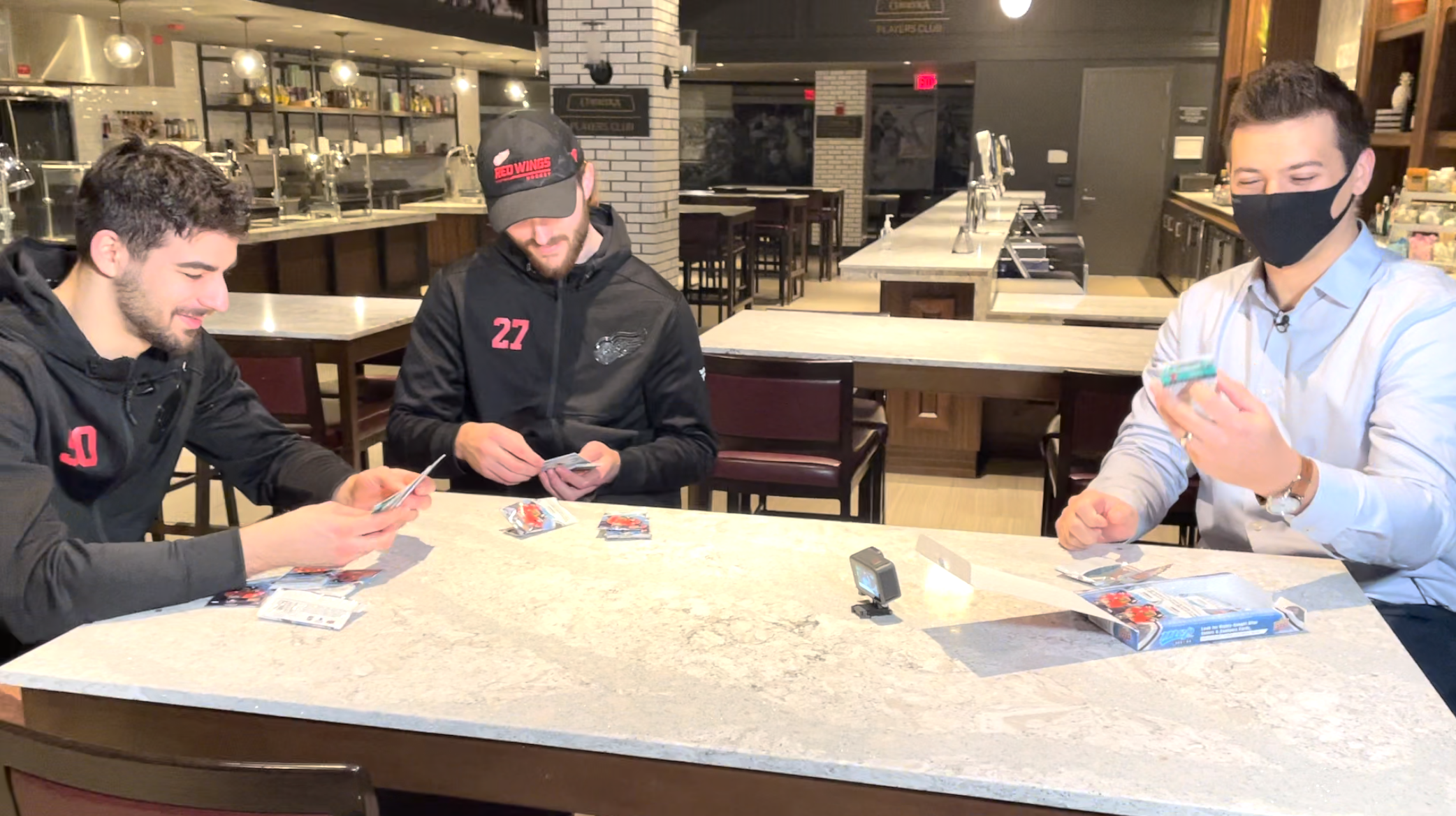 Joe Veleno Michael Rasmussen open cards with Brad Galli
