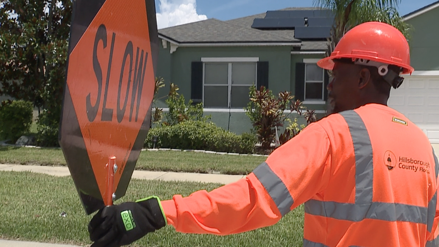 Outdoor workers keep cool amid record-breaking temperatures