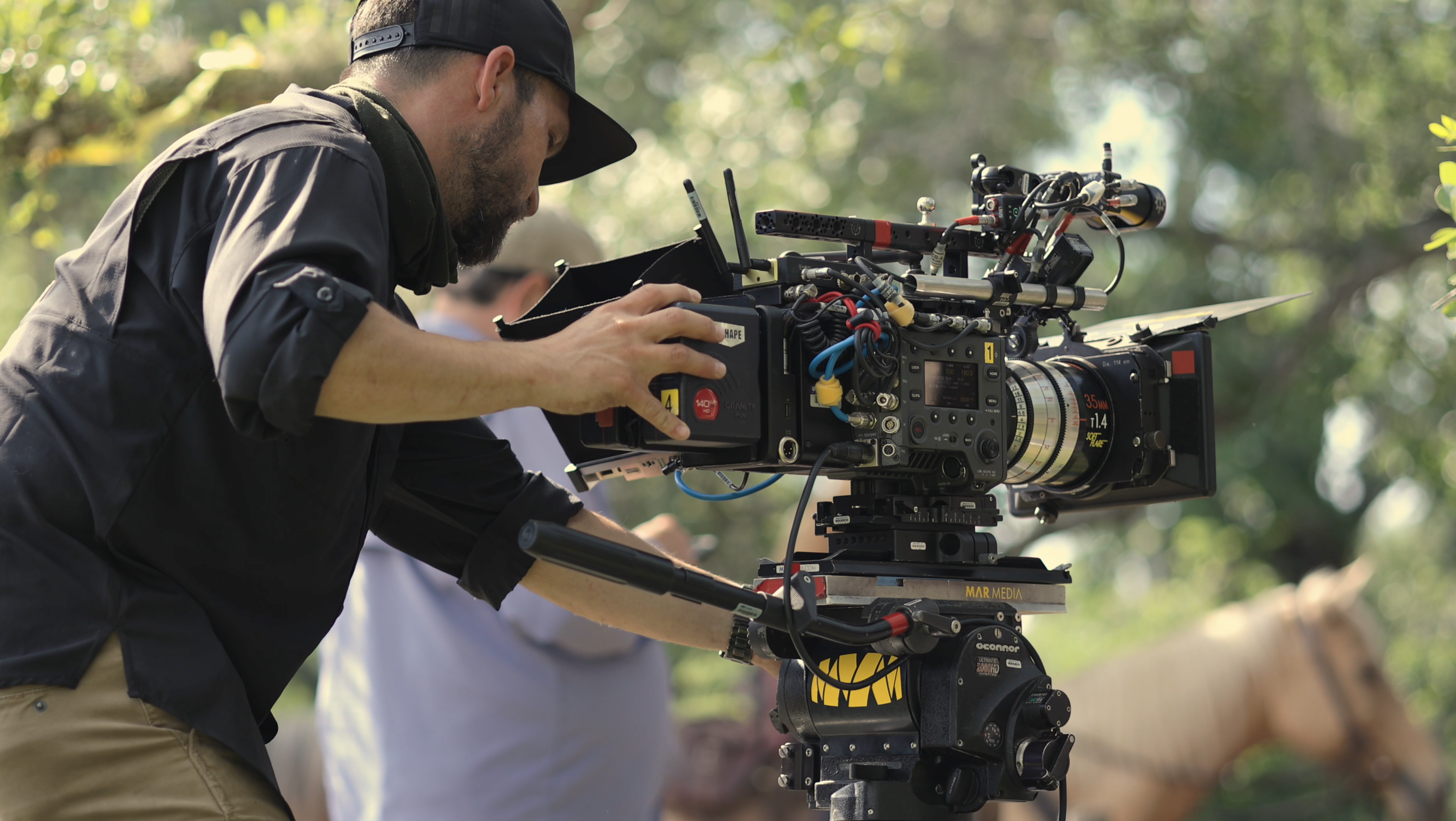 A photographer on set of the movie "Florida Wild" 