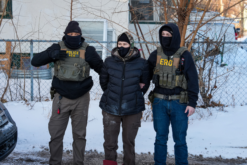 An activist is detained by federal agents on Tuesday, Feb. 3, 2026, in Minneapolis.