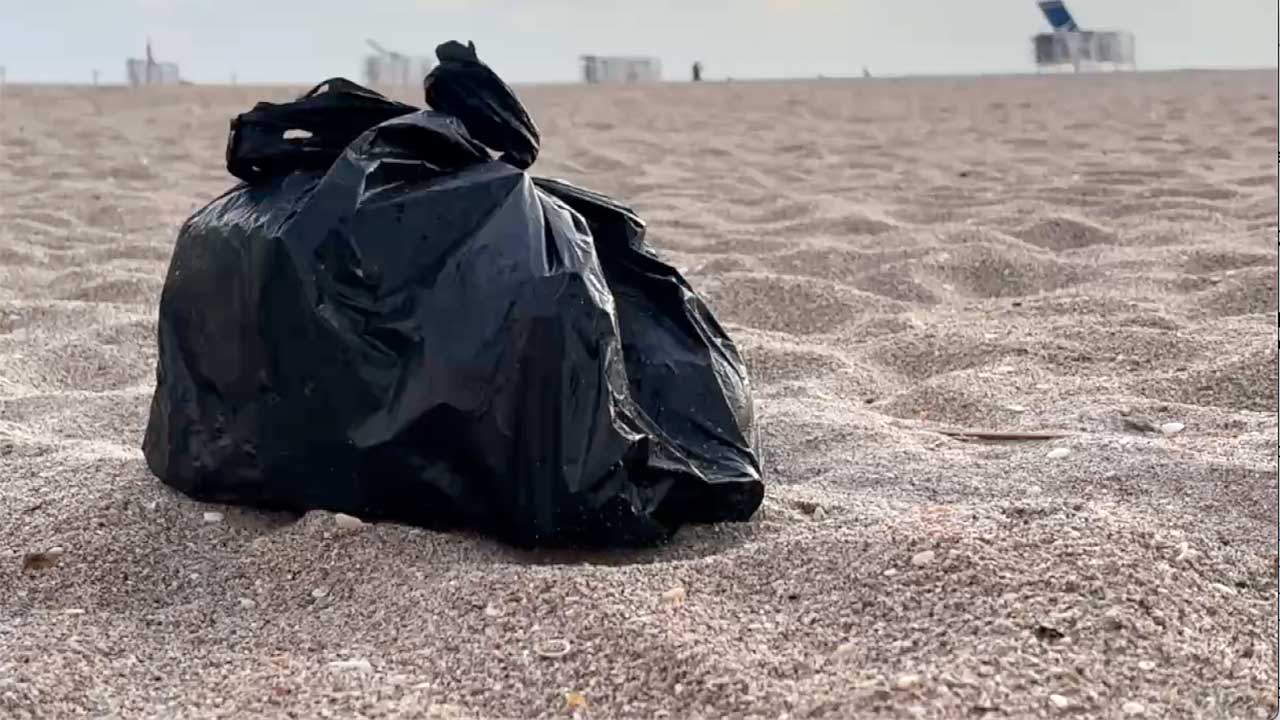Trash on Singer Island beach after Memorial Day 2026.