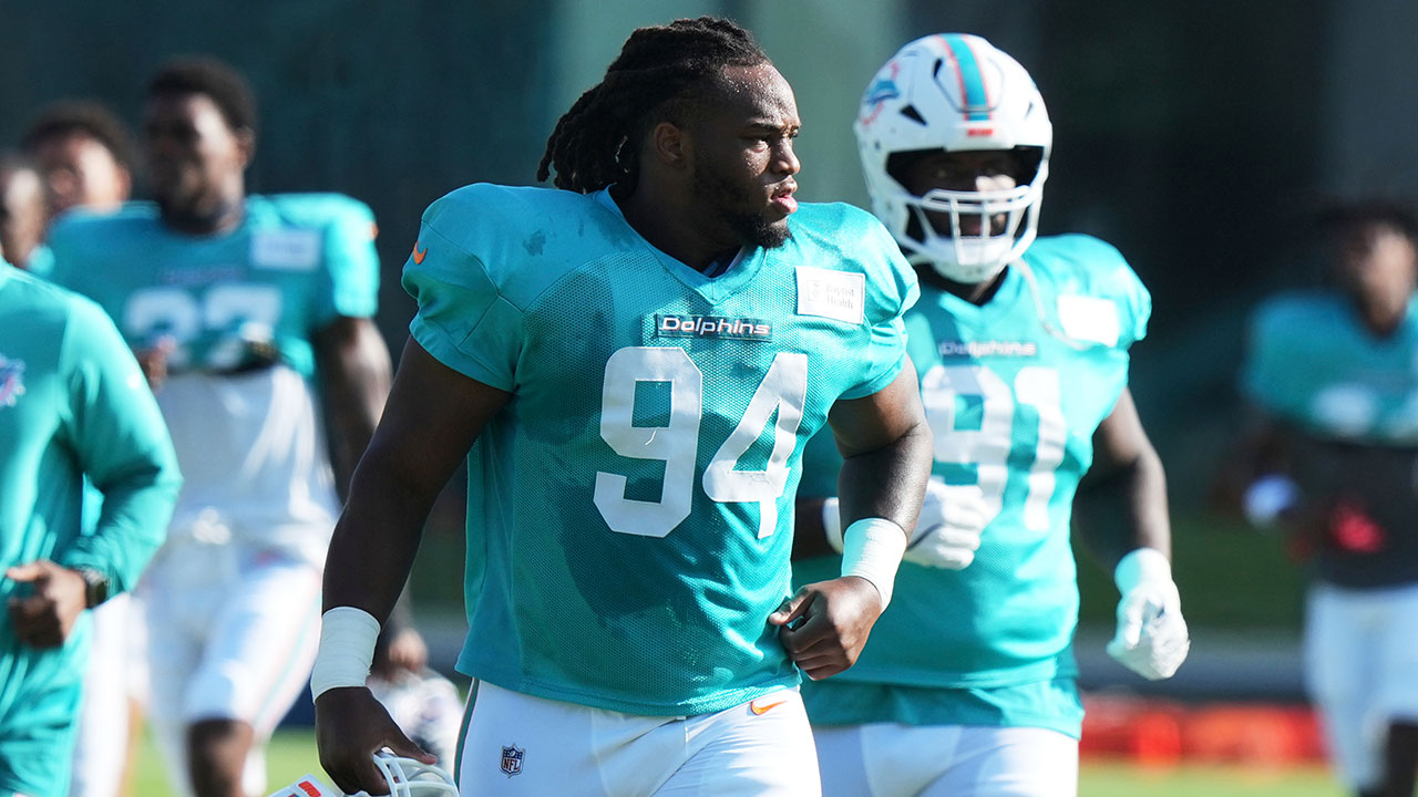 Miami Dolphins defensive tackle Jordan Phillips (94) runs onto the field during practice at the NFL football team's training camp, Tuesday, July 29, 2025, in Miami Gardens, Fla. 