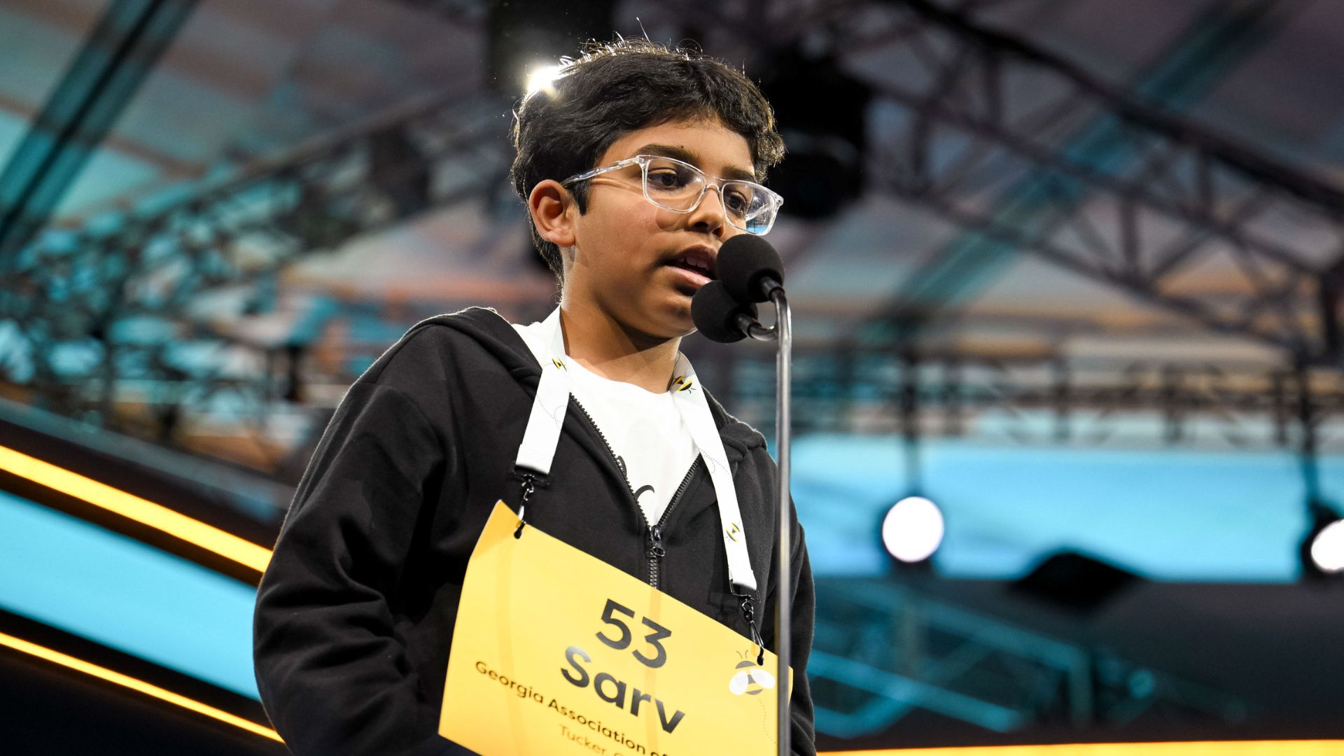 Speller 53, Sarv Dharavane of Tucker, Georgia, representing Georgia Association of Educators, competes in the Quarterfinals round for the 2025 Scripps National Spelling Bee on May 28, 2025 in National Harbor, MD.