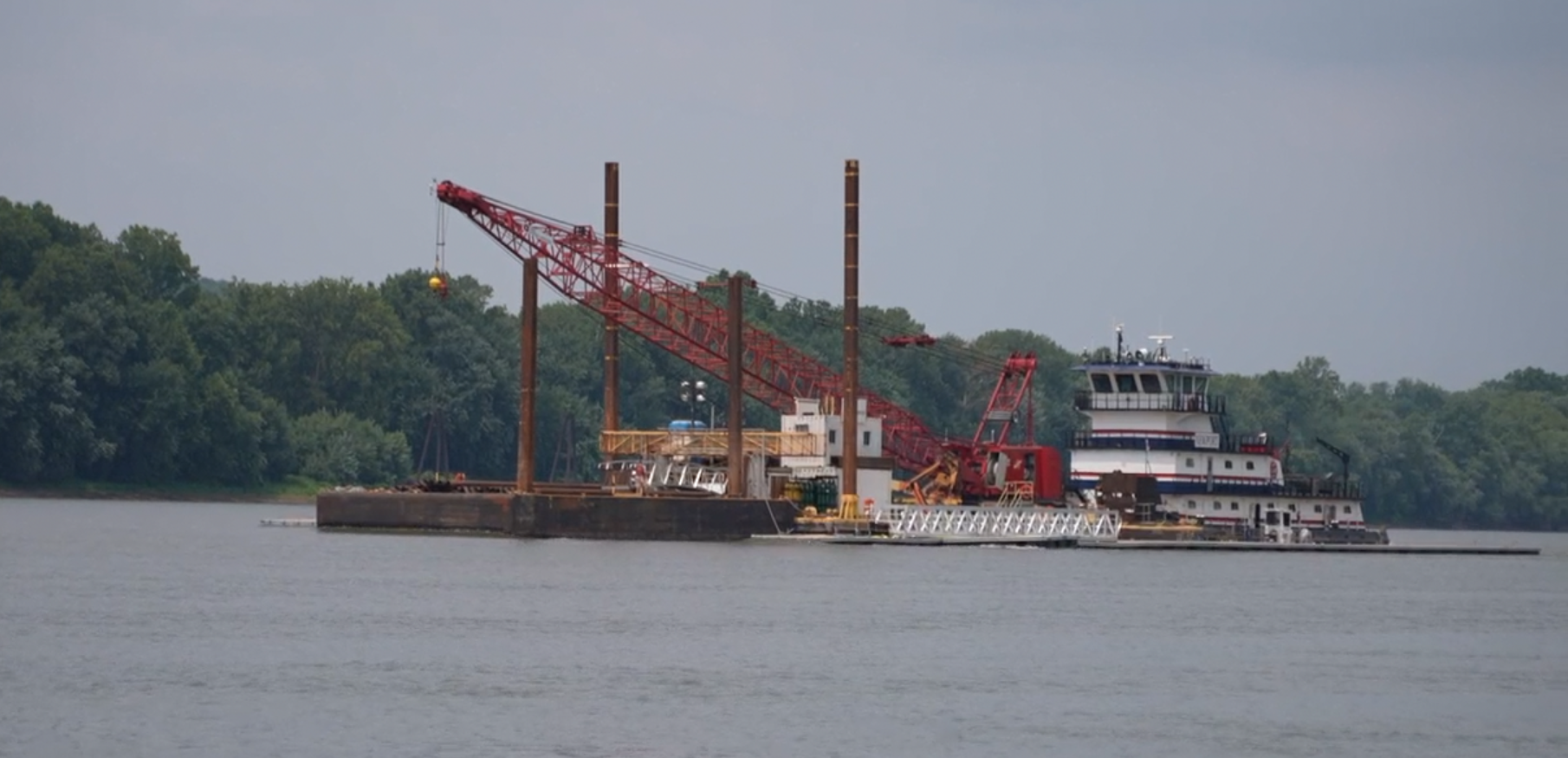 Boat bringing New Richmond's new boat dock along the Ohio River