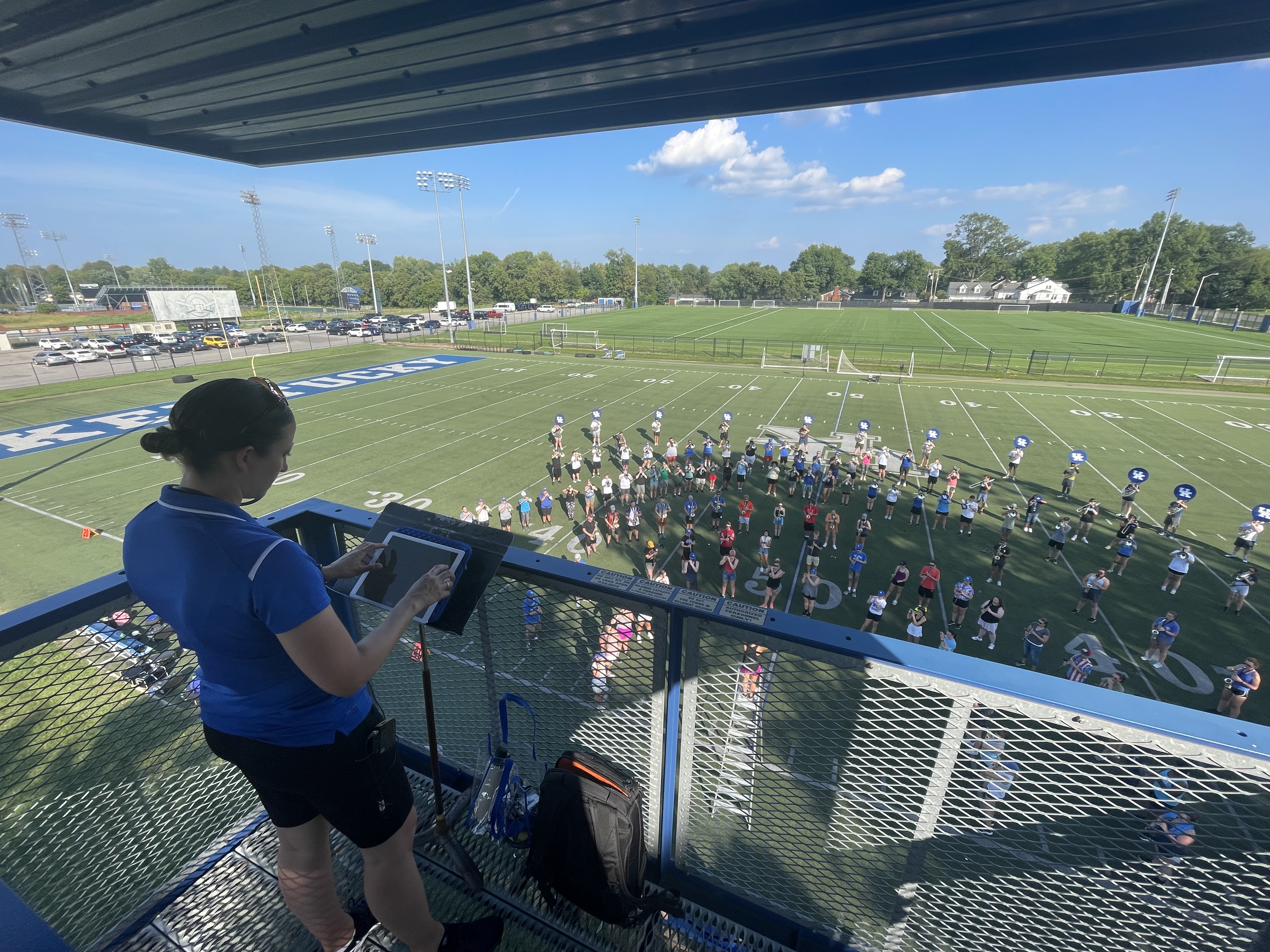 Dr. Shayna Stahl leads the Wildcat Marching Band during rehearsal