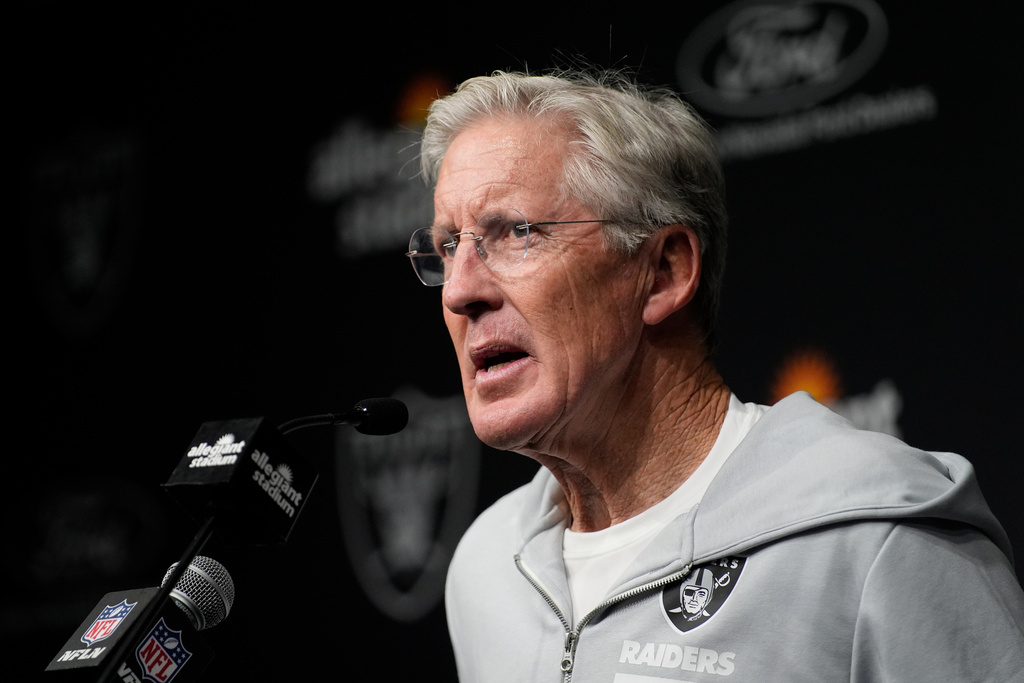 Pete Carroll speaks during a news conference following an NFL football game between the Las Vegas Raiders and Kansas City Chiefs.