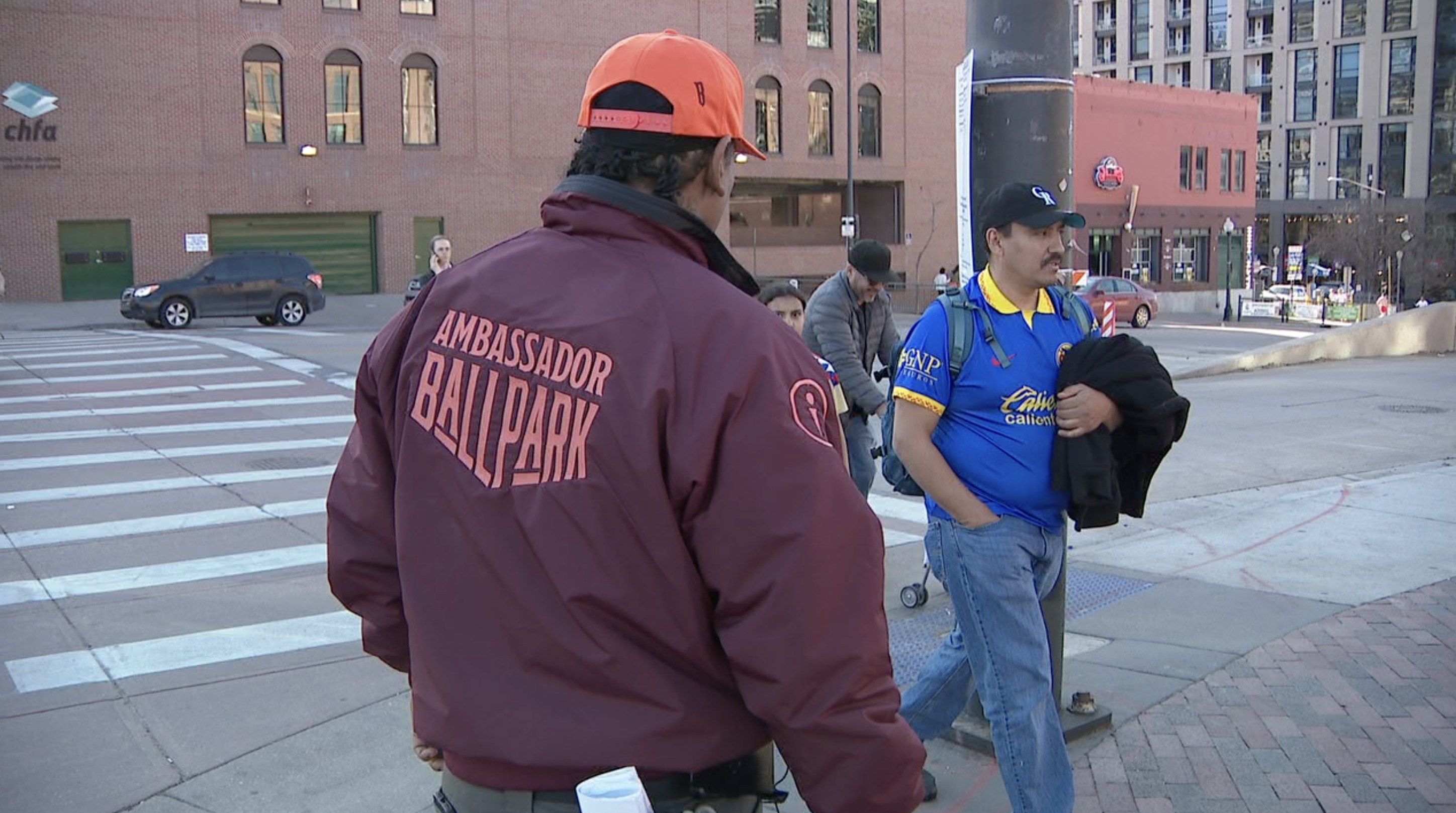 Ballpark Ambassadors started patrolling the streets around Coors Field and in the namesake neighborhood on Monday.
