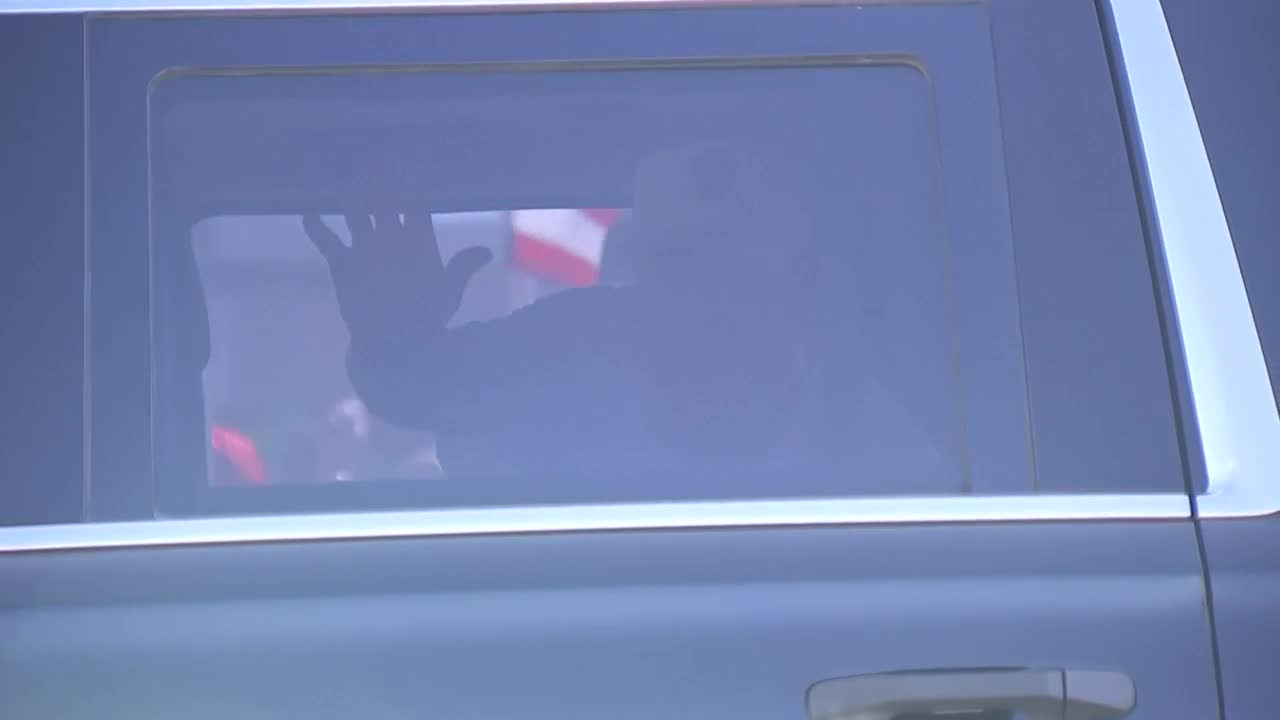 Former President Donald Trump waves to supporters at rally, Feb. 15, 2021