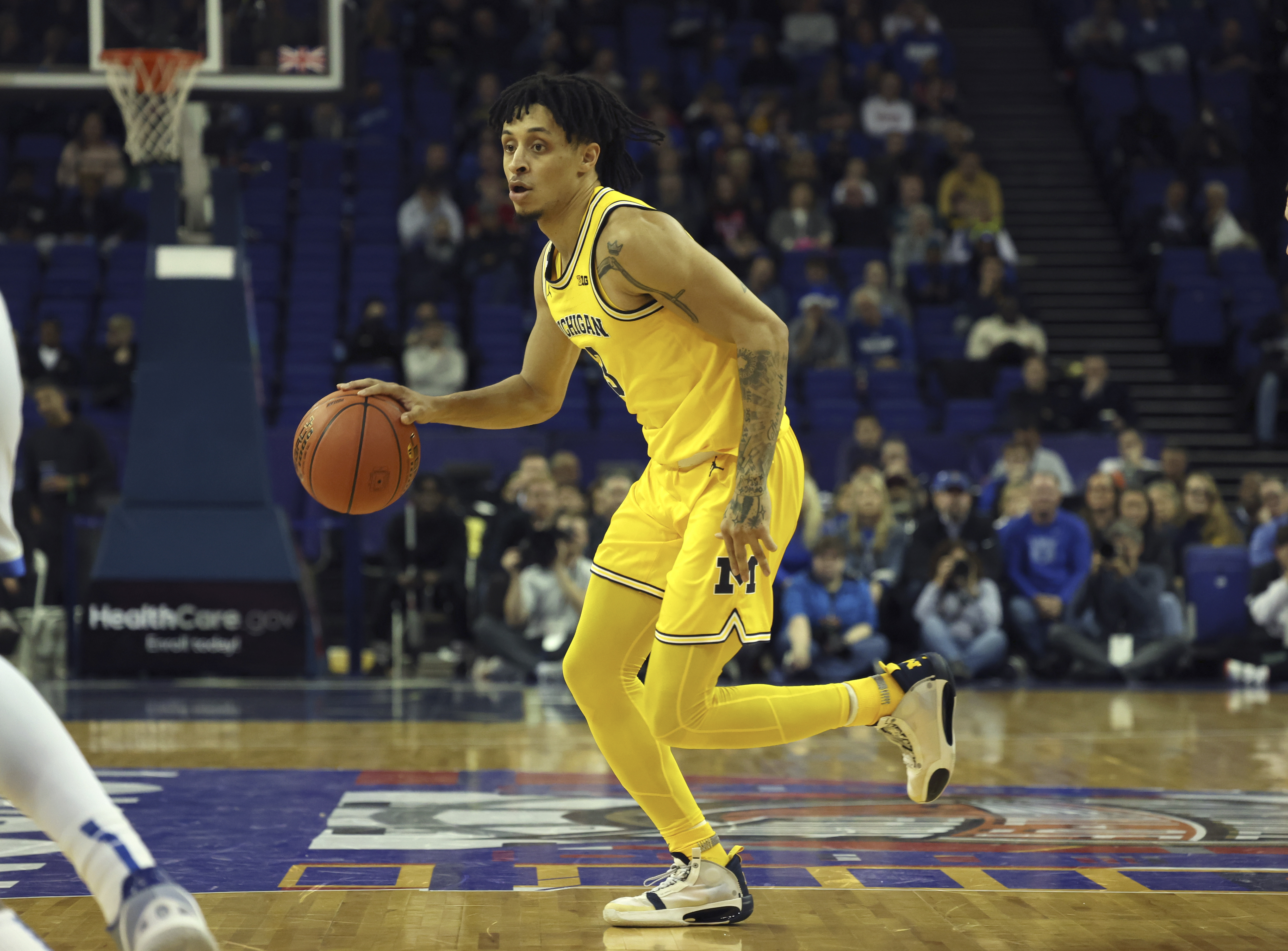 Britain Basketball Michigan Kentucky