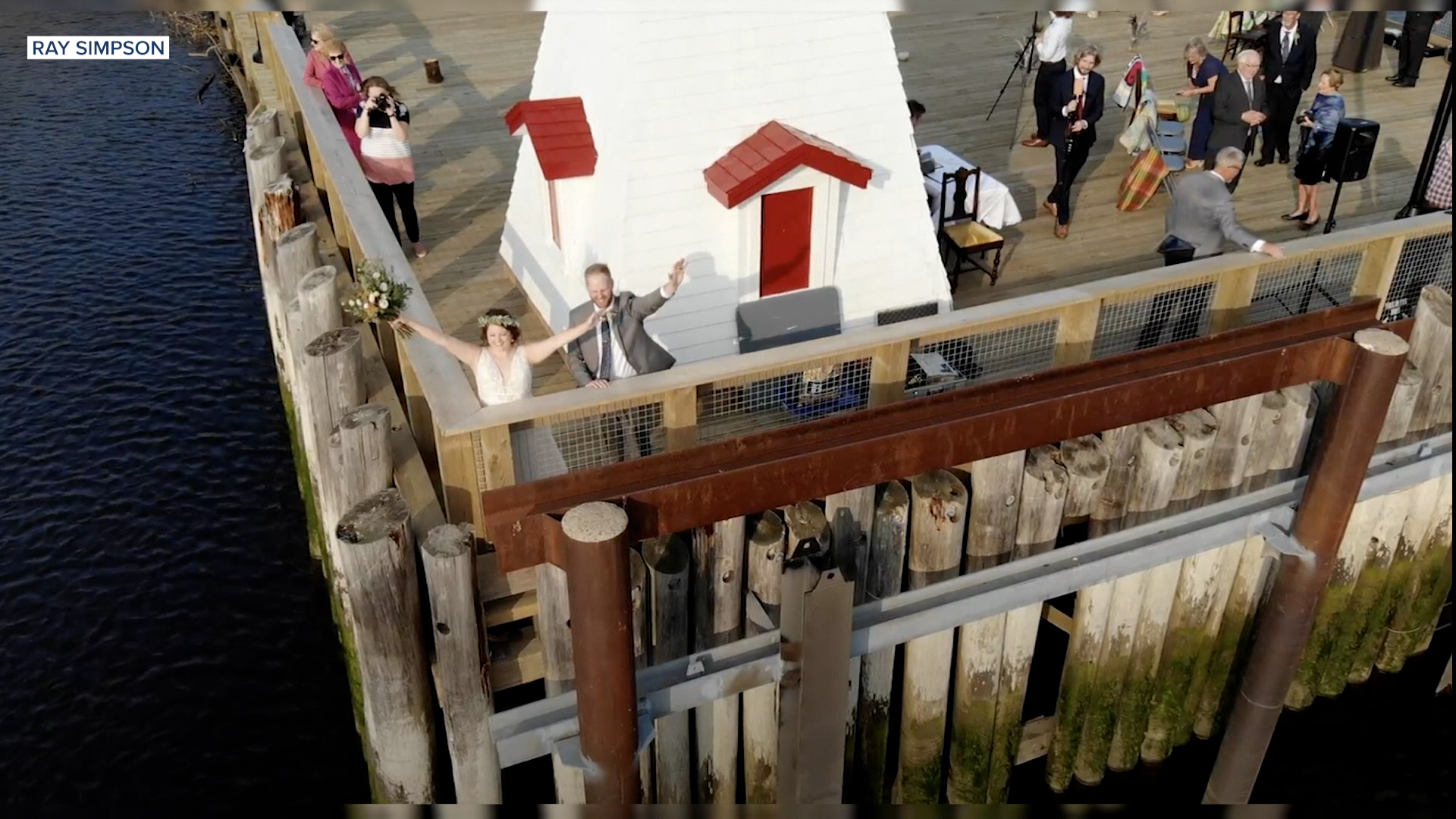 Couple weds outside along US-Canada border so everyone could attend