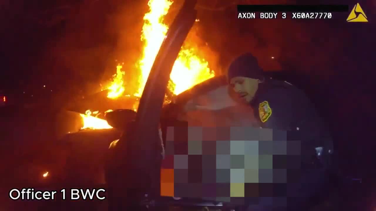 WATCH: Video shows Virginia Beach officers saving driver from fiery car crash