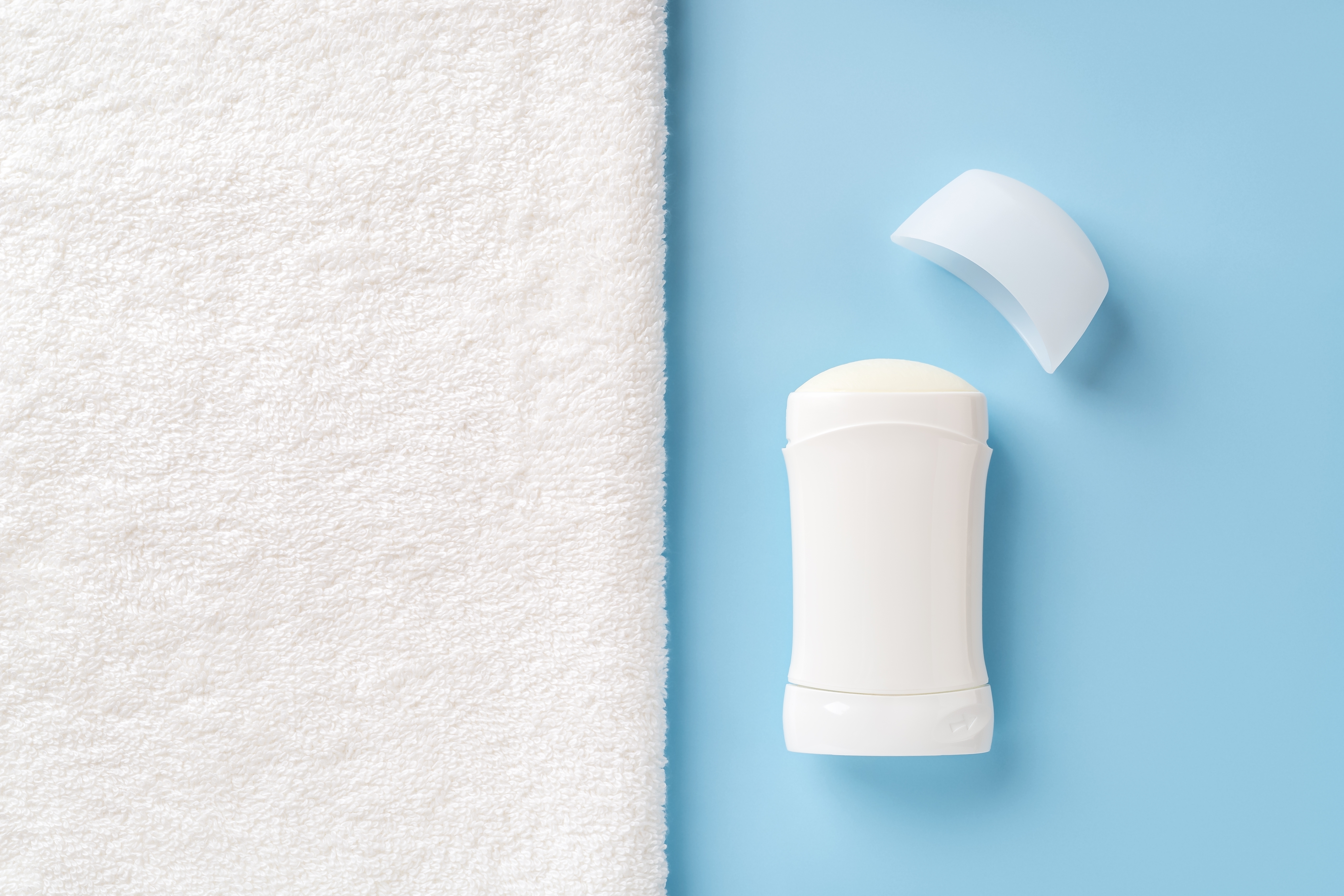 A towel and deoderant stick