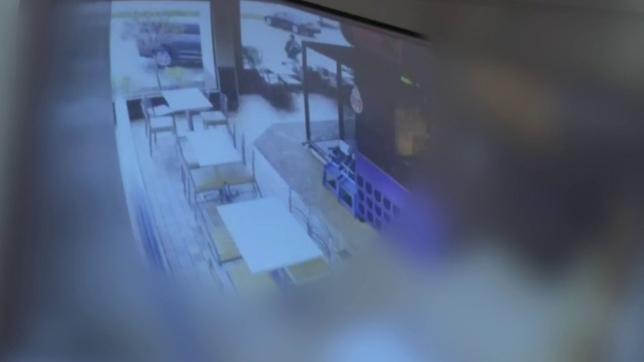 Surveillance video shows unmarked police car hit 25-year-old man